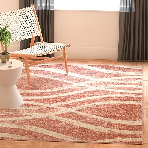 SAFAVIEH Adirondack Collection ADR125Z Modern Wave Distressed Non-Shedding Living Room Bedroom Dining Home Office Area Rug, 6' x 9', Rose / Cream