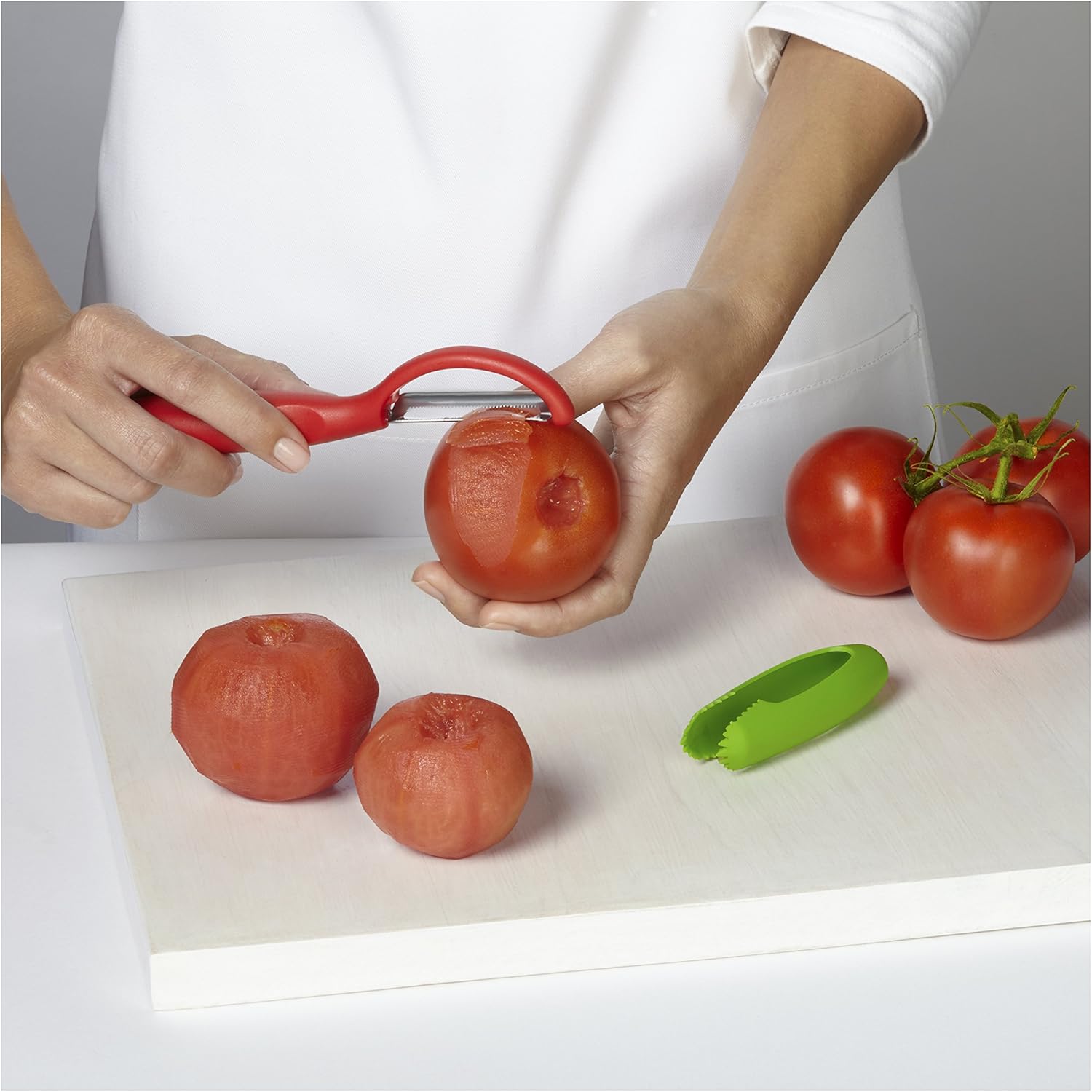 Kuhn Rikon Serrated Piranha “Swivel” Peeler 7.25” Green: Home & Kitchen