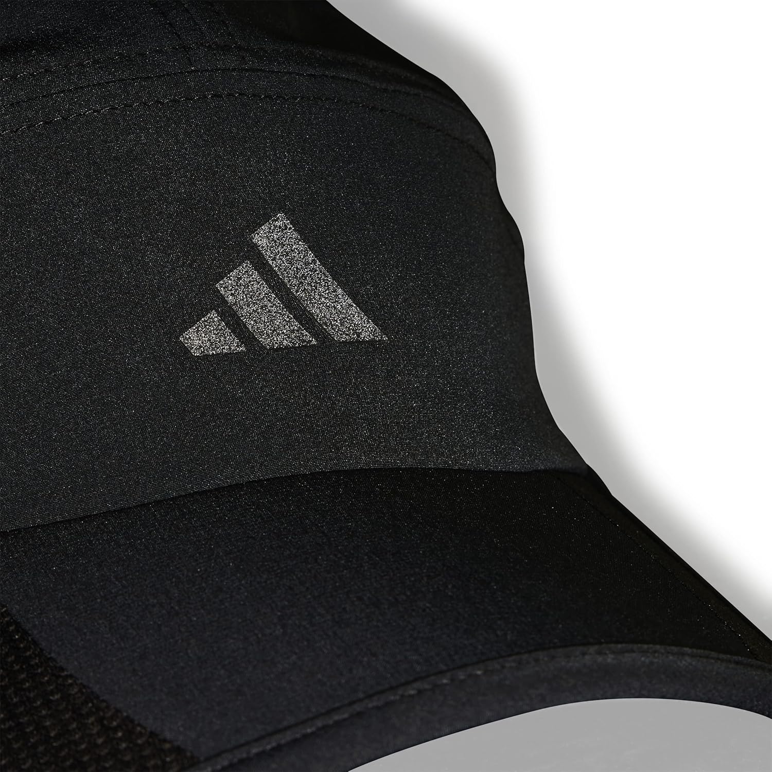 Close-up of the Adidas logo on the front of the RUNxSPNV C A.R. Running Cap.