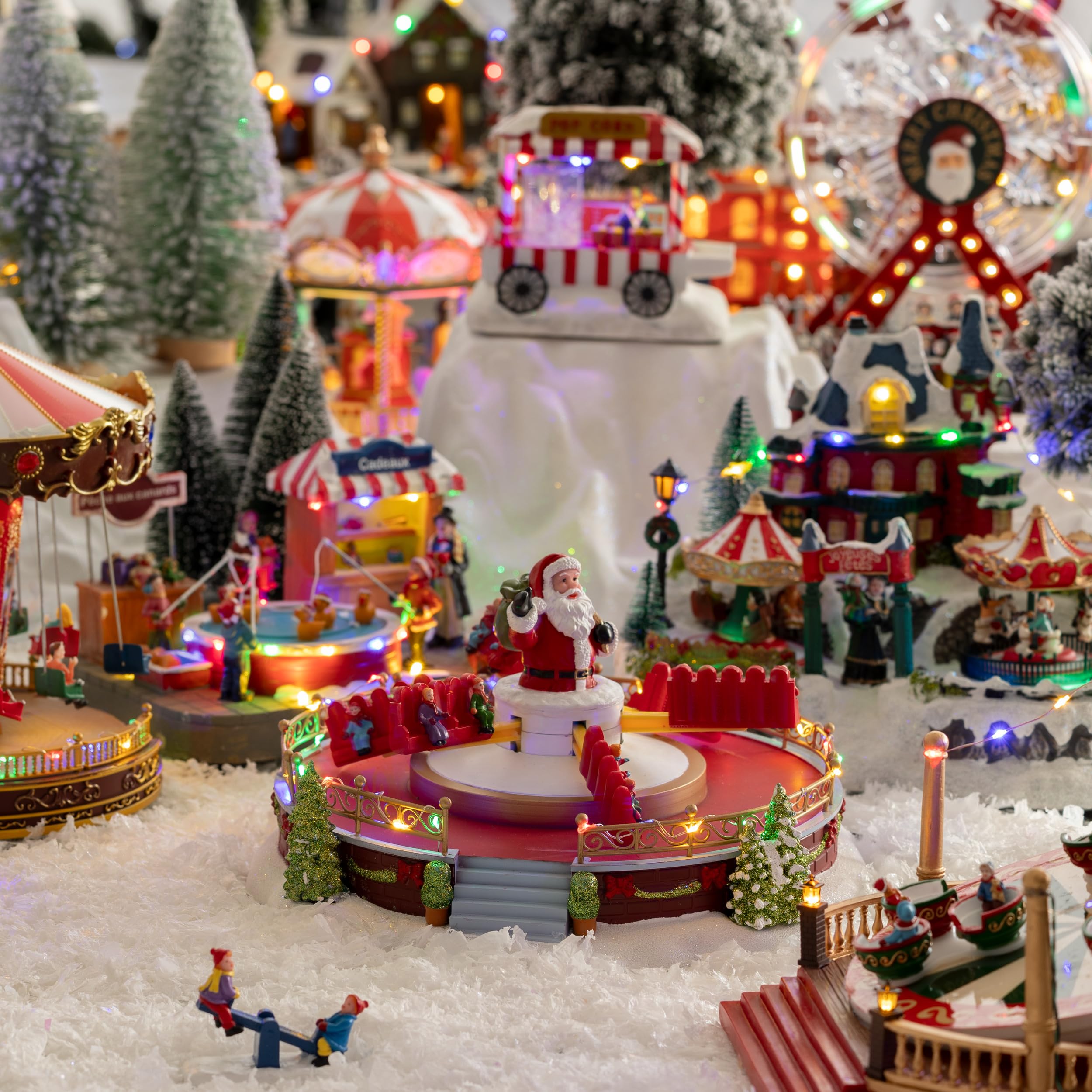 Feeric Lights et Christmas - Village Lumineux manège père noël 25 LED Multicolore Musical