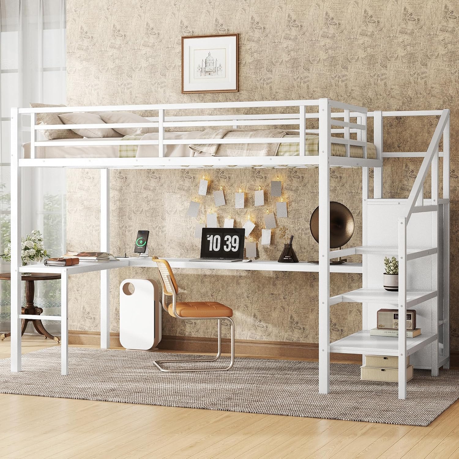 Loft bed desk area with a laptop, lamp, and decorative items