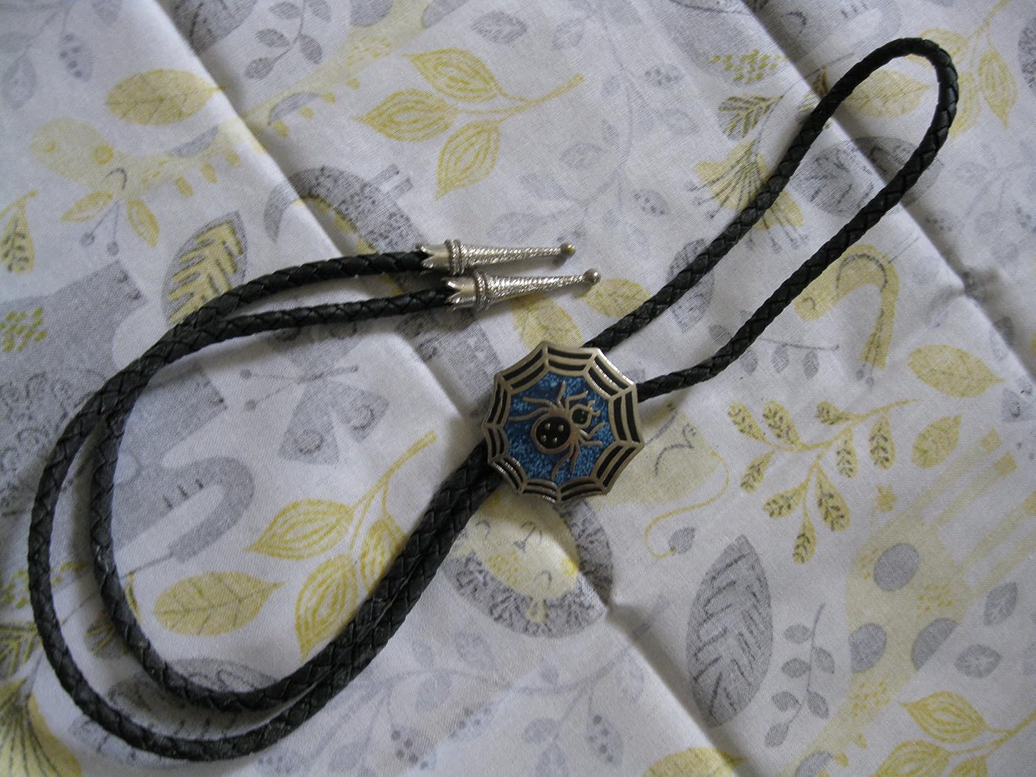Aesthetic Design spider web Bolo Tie/turquoise setting w. Braided Leather lanyard (33 inches length)