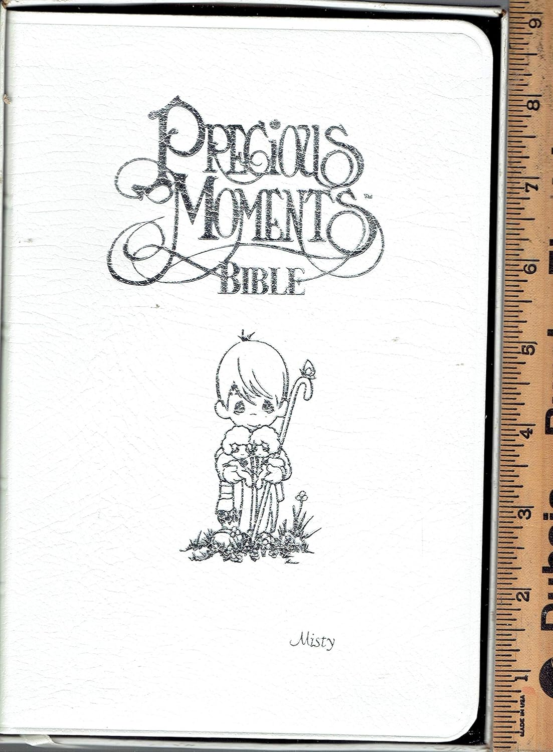 Heirloom Edition White Bonded Leather Precious Moments NKJV Bible      Leather Bound – January 1, 1985
