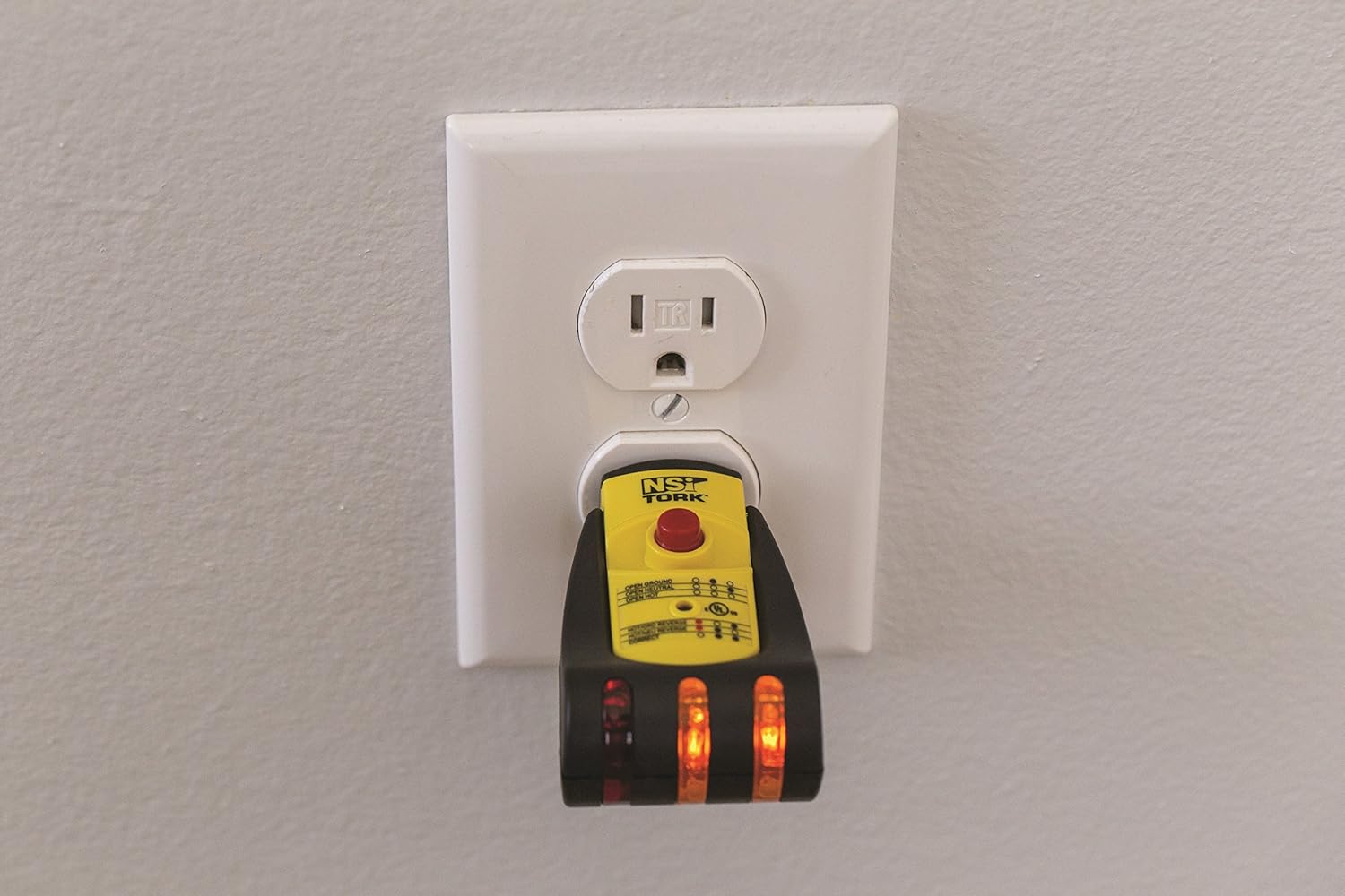 Close-up of NSi Industries TES-131 GFCI test button