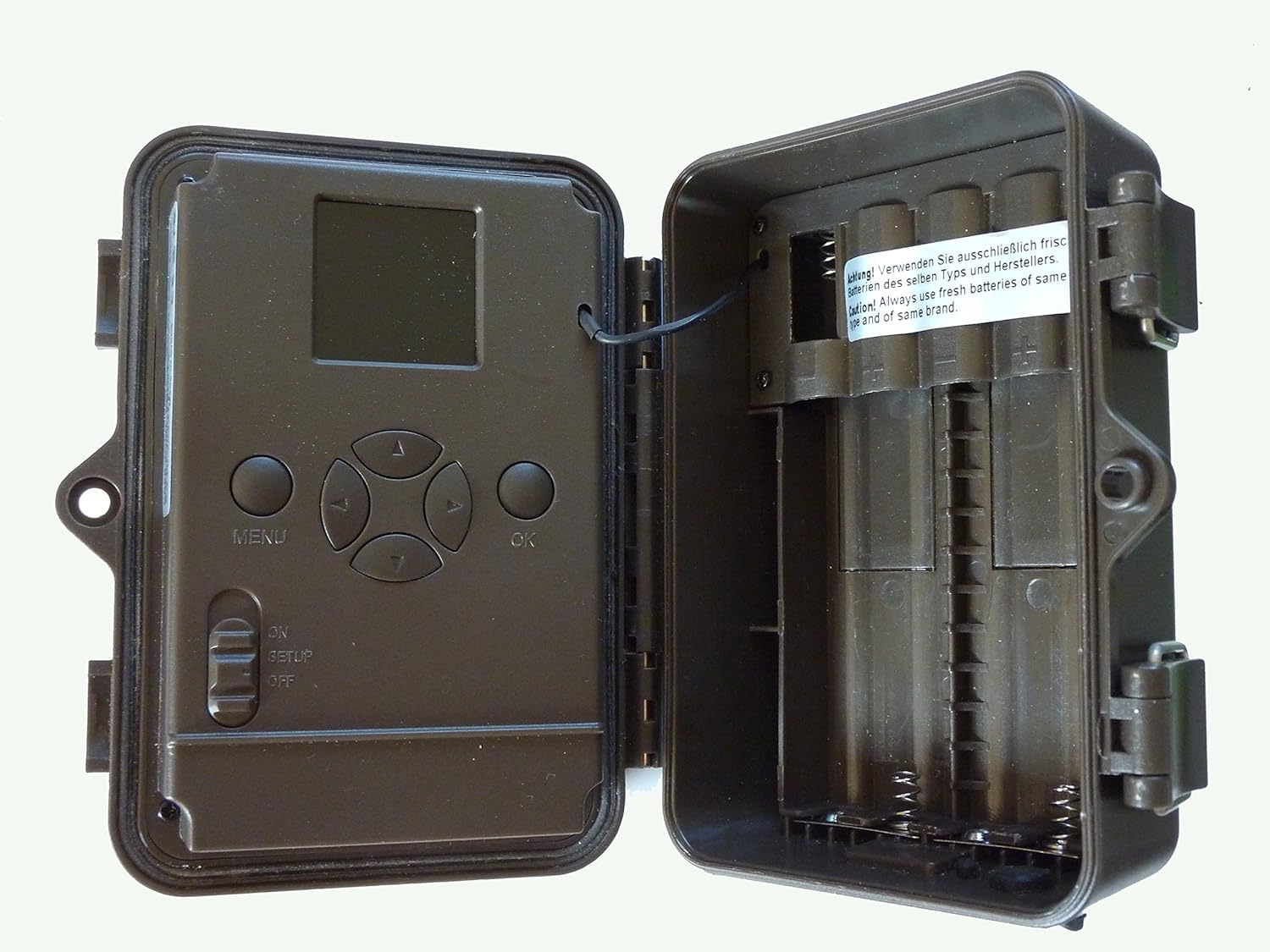 Internal view of the Dörr Snapshot Limited camera showing battery compartments and SD card slot.