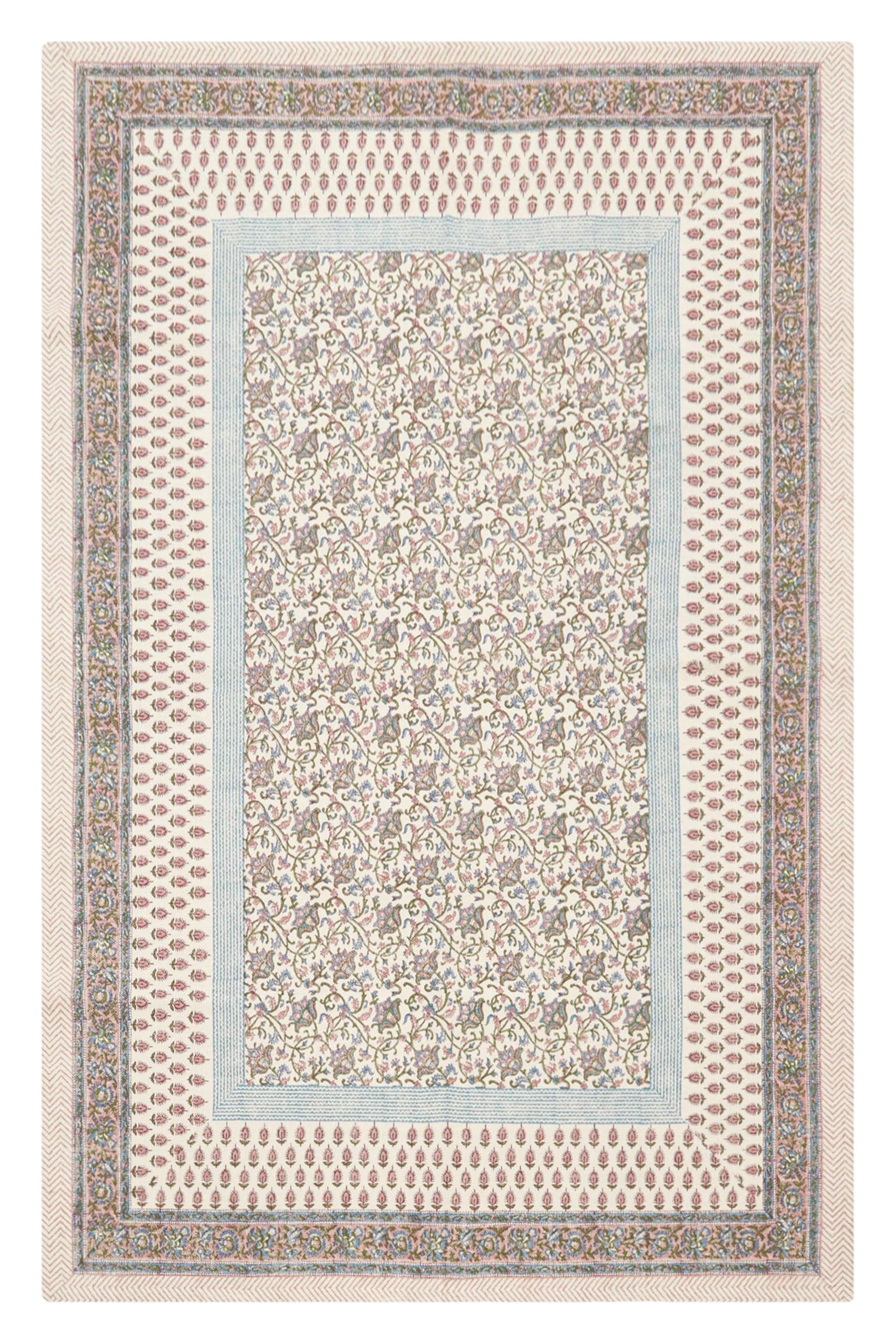Tapis kilim floral en coton dhurrie pour sublimer l'ambiance chaleureuse de votre salon