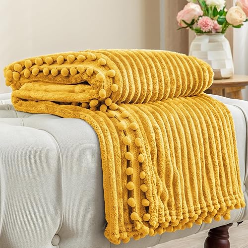 BEDELITE Manta de forro polar para sofá  Manta decorativa a rayas con flecos de pompones, suave y acogedora manta mullida para cama, sofá (amarillo
