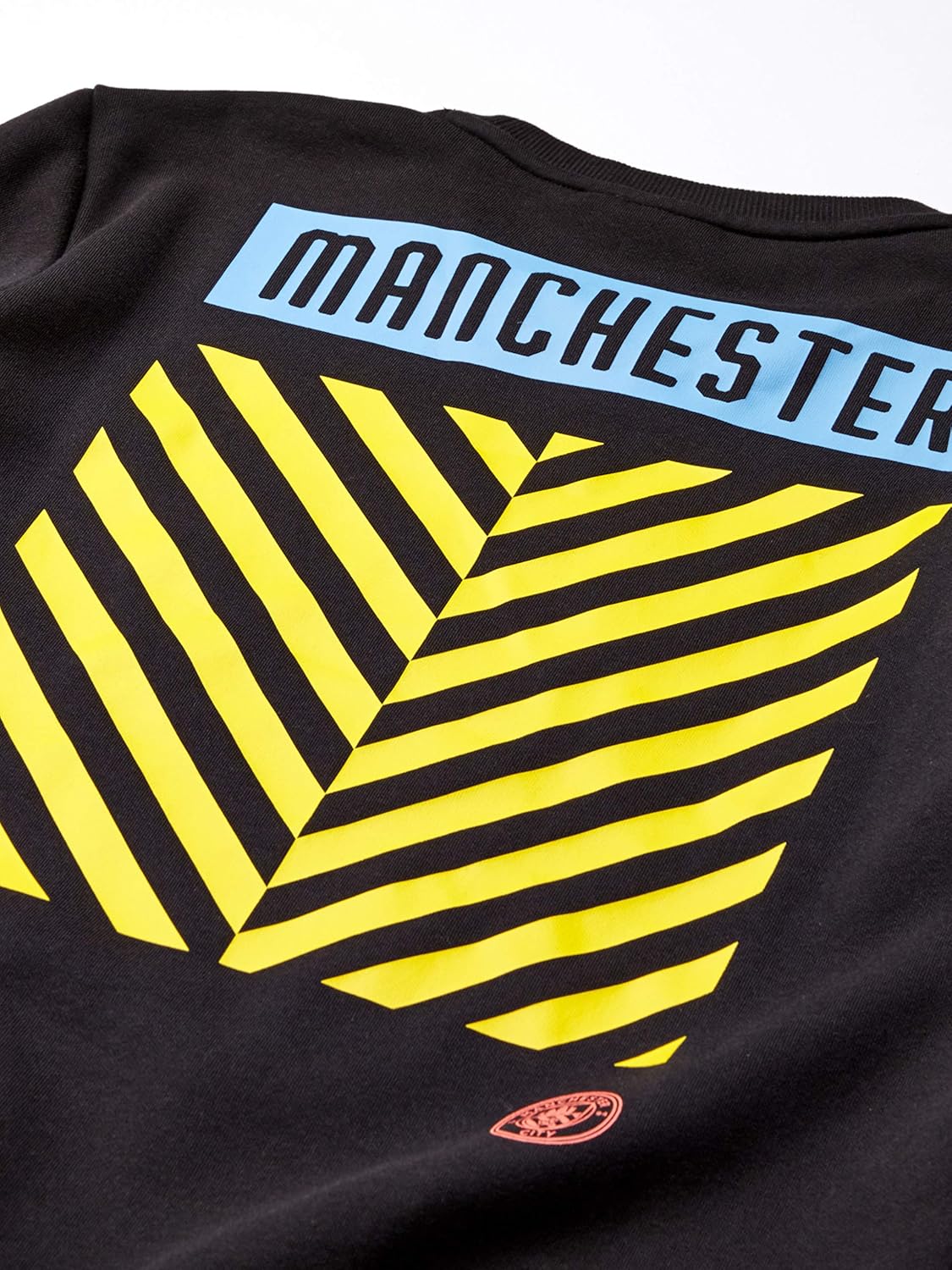 PUMA Mens International Soccer FtblCulture Sweater Manchester City, PUMA Black/Georgia Peach, Medium : Sports & Outdoors