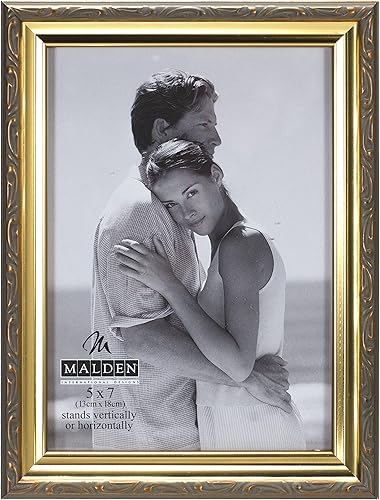 Malden Diseños internacionales. Portarretrato de matera y metal a la moda.