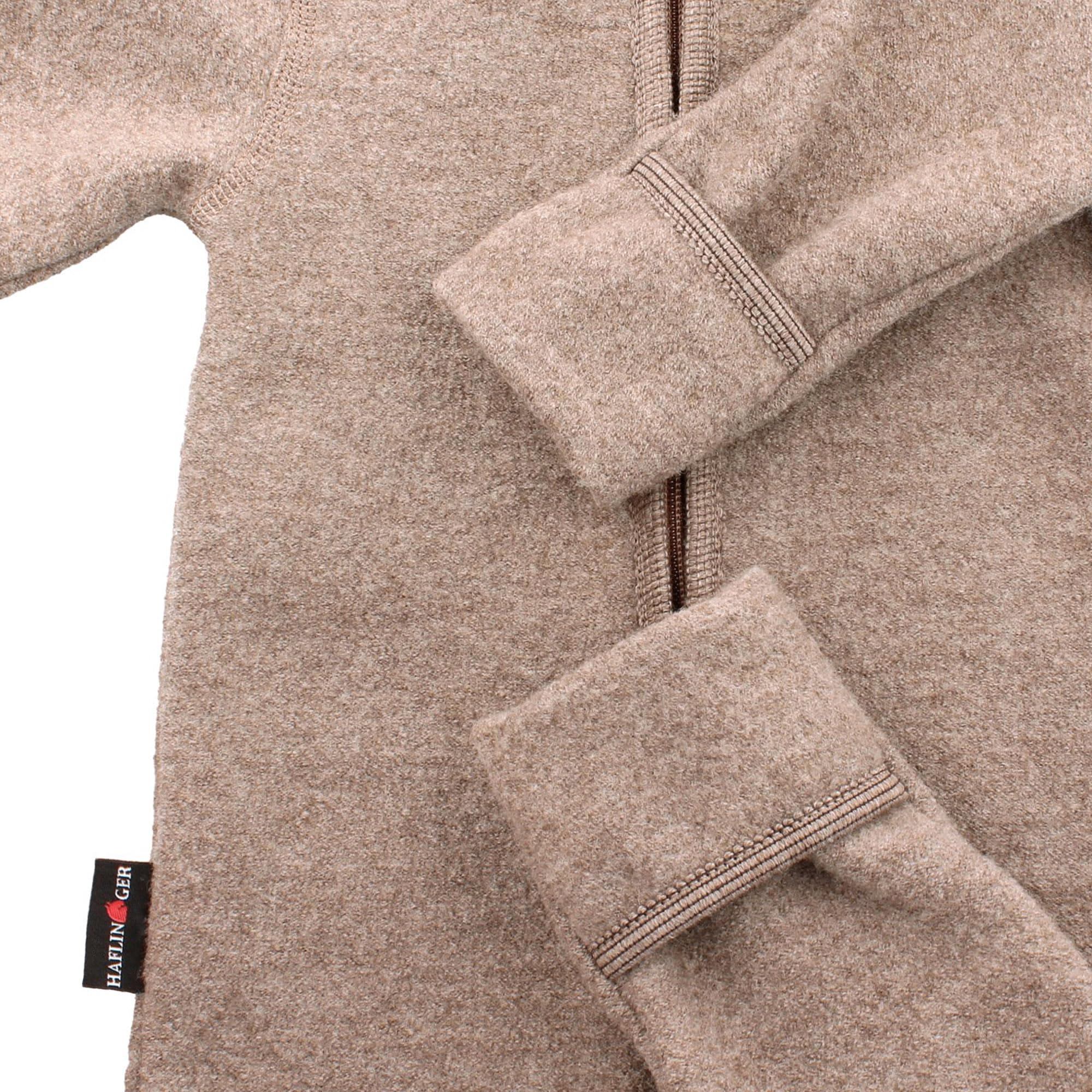HAFLINGER Premium Baby Kinder Walkoverall aus Merinowolle