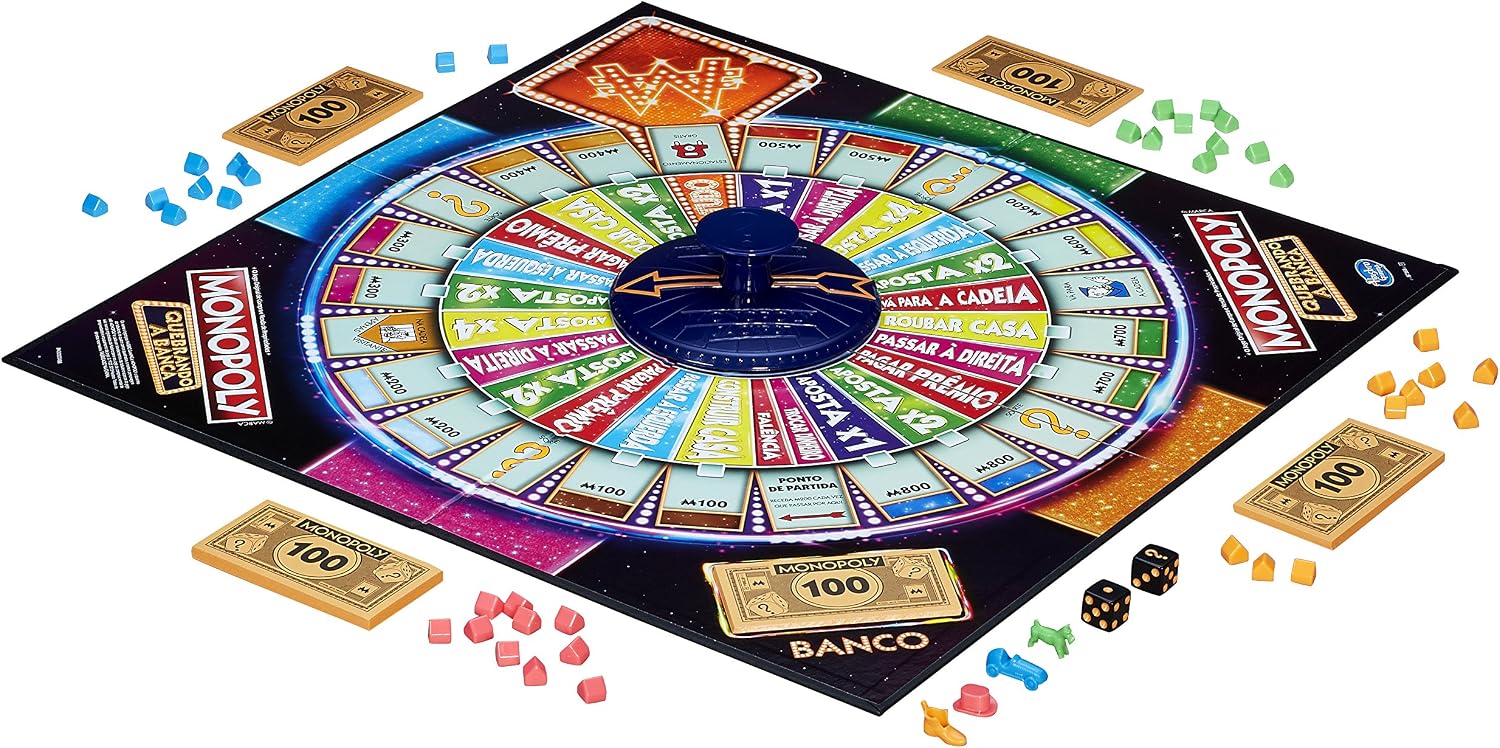 Monopoly Break the Bank game board set up with tokens, money, and the central fortune wheel.