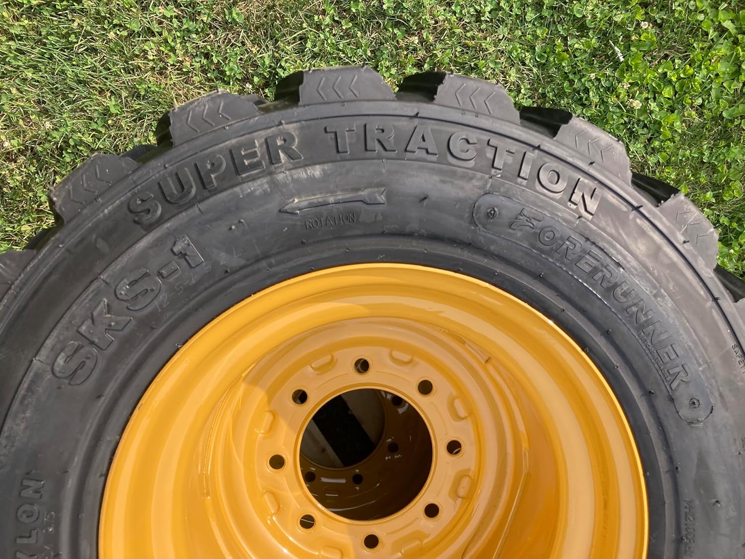 Set of 4-12-16.5 Forerunner SKS-1 Skid Steer Tires on Wheels/Rims (8 lug) for CAT 236, 242, 246, 248, 252, 256, 262, 272 & more - 14PLY - 12X16.5