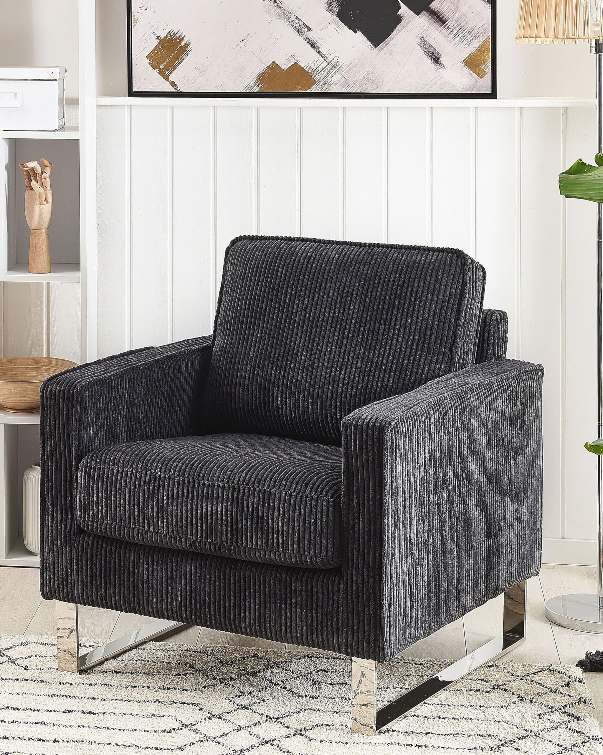 Beliani Retro Sessel Cord Füße aus Edelstahl schwarz Vind