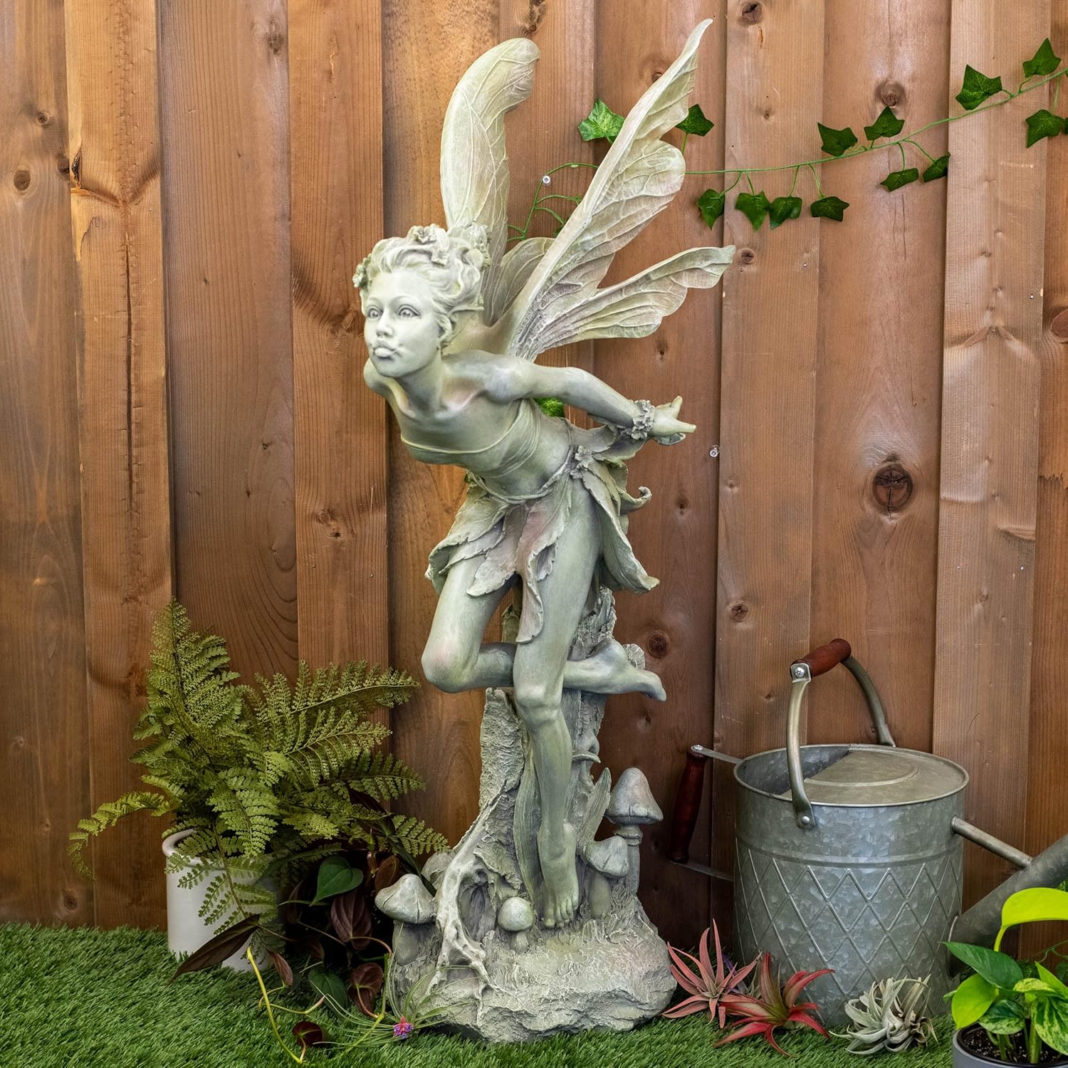 Napco Imports Resin Stone Kissing Fairy Statue with Greenish Finish 14101