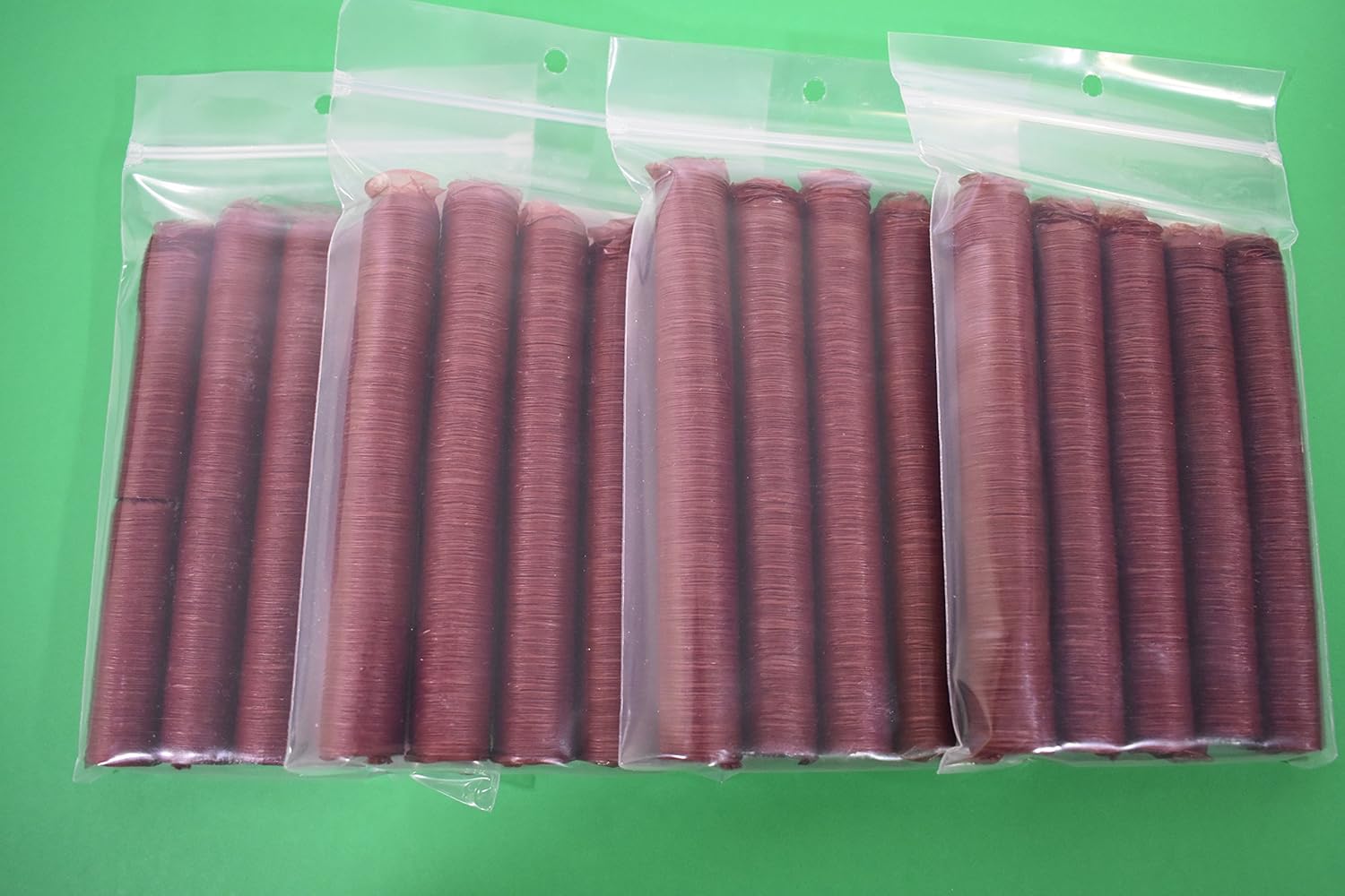 Four Packs of 21 mm Casings for 100 lbs of Snack Sticks, Slim Jims, Pepperoni. Edible. Easy to use. Use for Fresh Homemade Snack Sticks and Slim Jims. Over 180' of Snack Stick casing