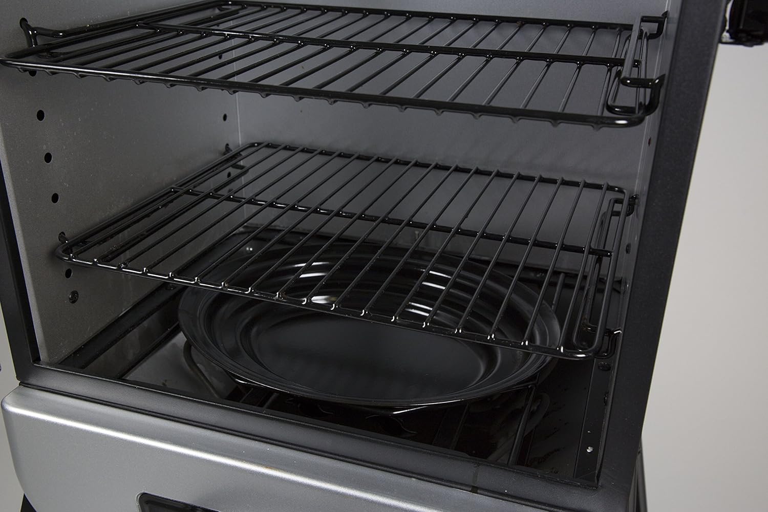 Interior of Pit Boss Smoker with Racks and Water Pan