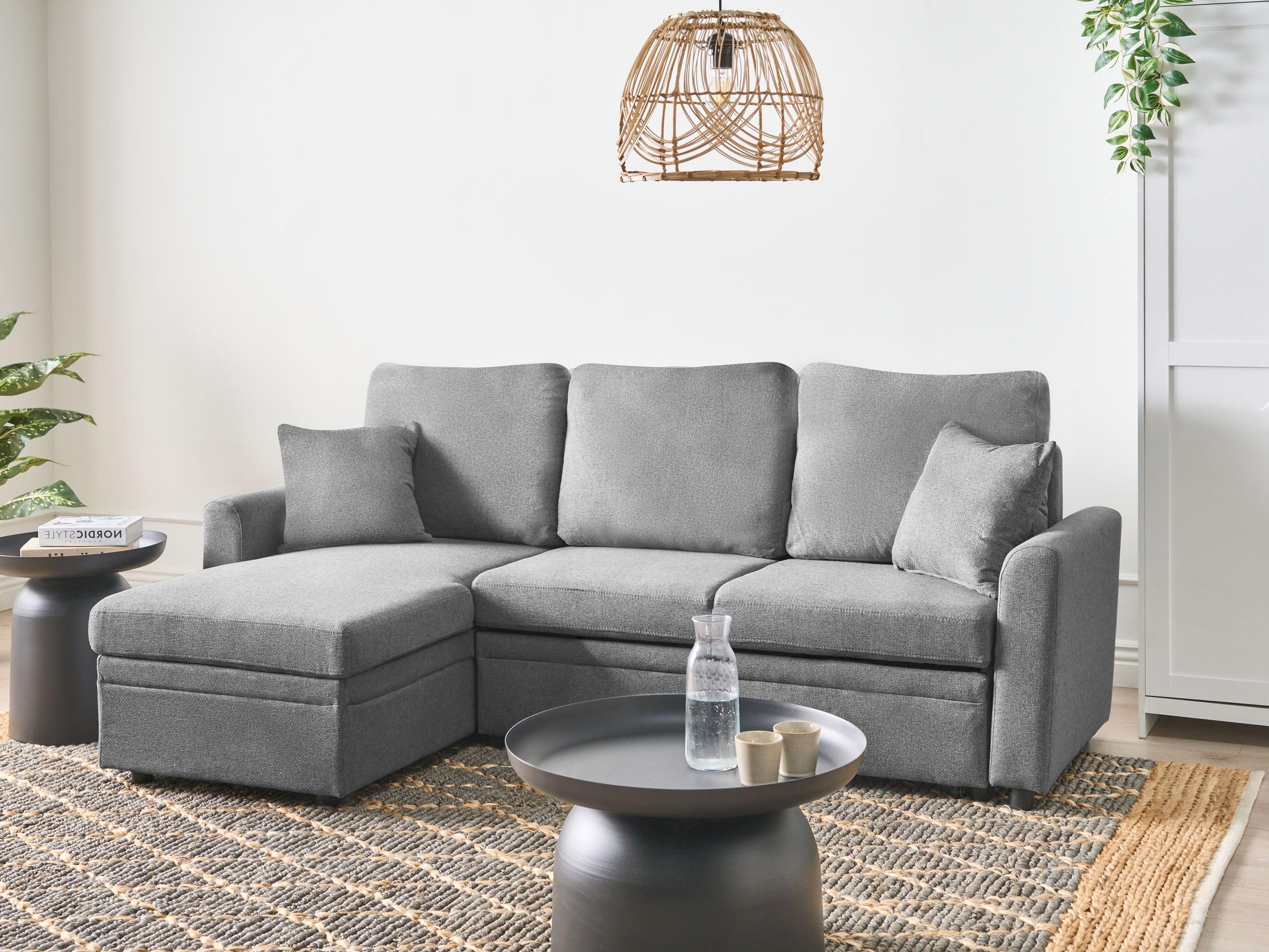 Nowoczesna sofa narażona rozkładana przechowywanie narożnik tapicerowany prawostronny oparcie z dodatkowymi poduszkami szara Nassjo