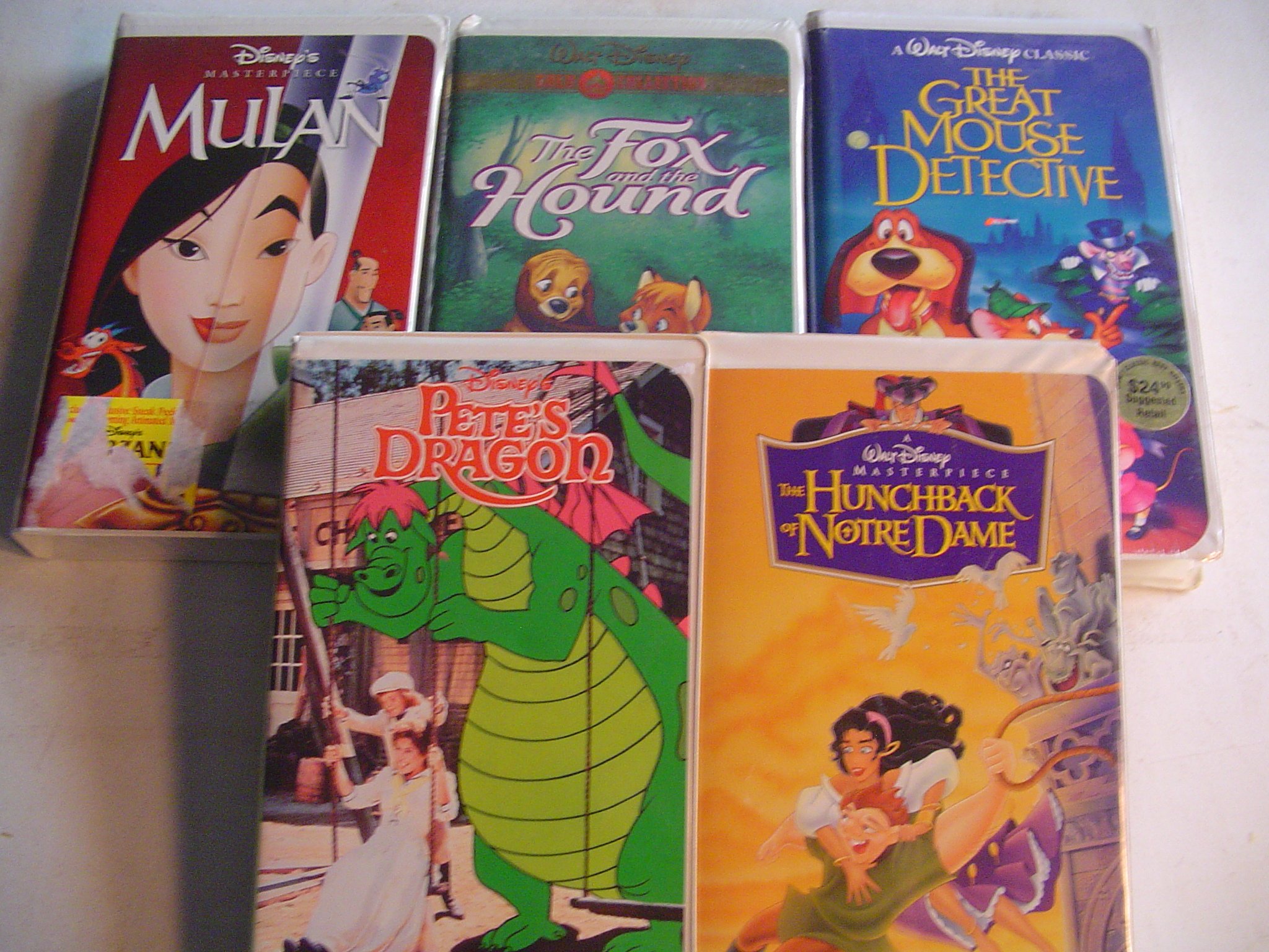 Walt Disney's 5 Pack: The Fox And The Hound (A Walt Disney Classic), Mulan (Gold Collection), The Great Mouse Detective (A Walt Disney Classic), The Hunchback Of Notre Dame (A Walt Disney Classic) and Pete's Dragon (Masterpiece Collection).
