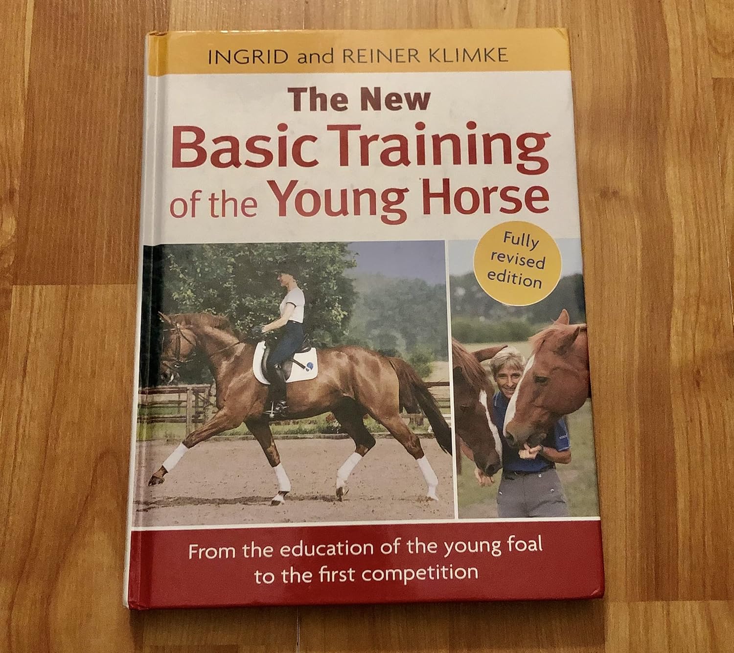 The New Basic Training of the Young Horse: From the Education of the Young Foal to the First Competition