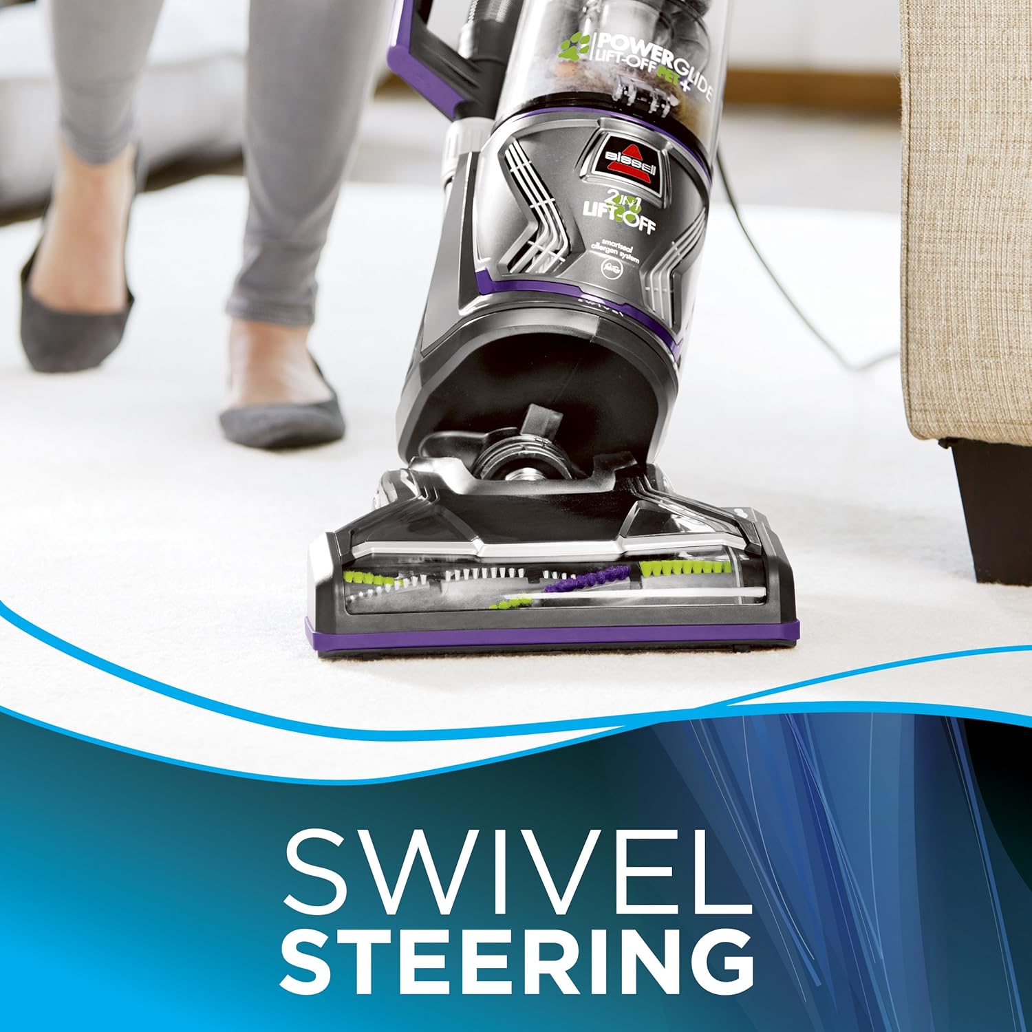 Bissell PowerGlide Lift-Off Pet Plus vacuum demonstrating swivel steering around furniture.