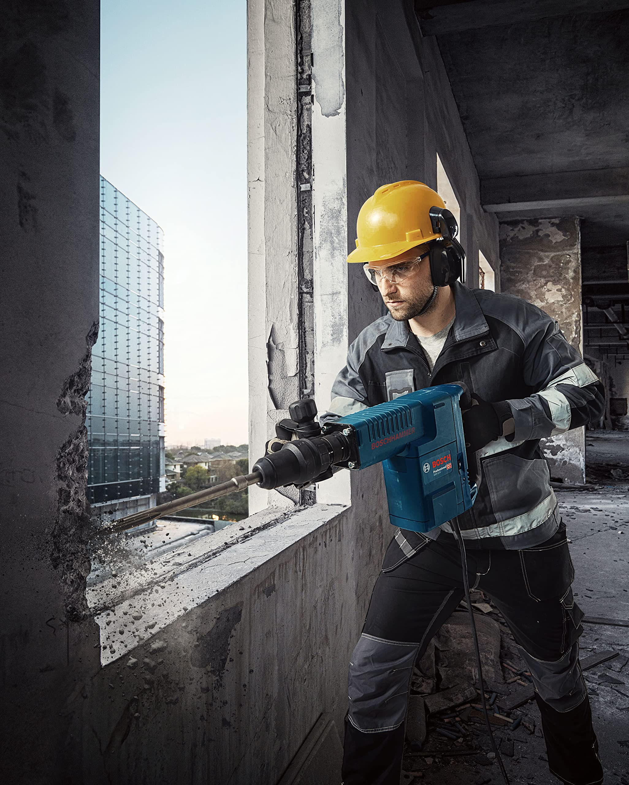 Bosch Professional: młot udarowy GSH 11 E (1 500 W, liczba udarów przy nominalnej prędkości obrotowej 900 – 1.890 min-1, rękojeść dodatkowa, 1 dłuto płaskie, smar w tubie, sukno maszynowe, walizka)