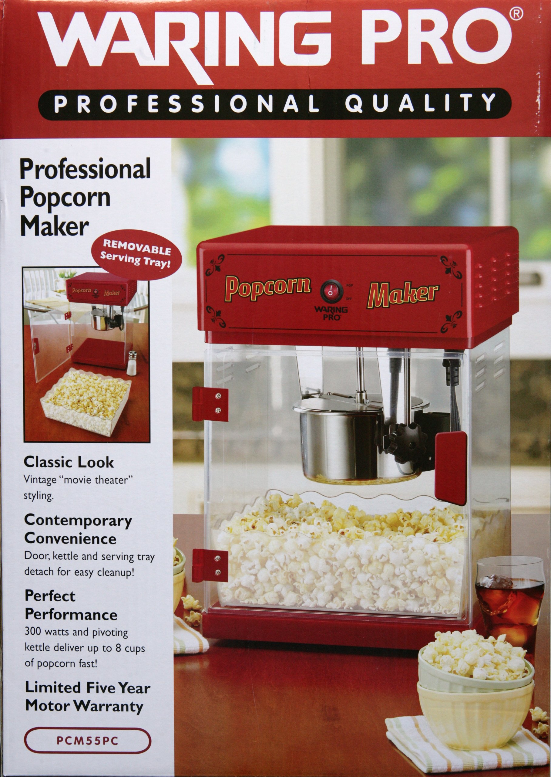 Waring Pro Professional Popcorn Maker, red and silver, filled with popcorn