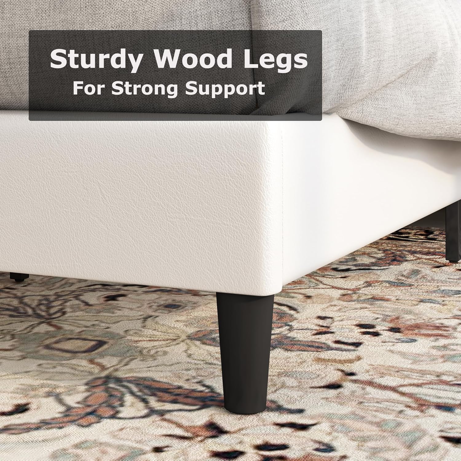 Close-up of sturdy black wooden legs supporting the bed frame.