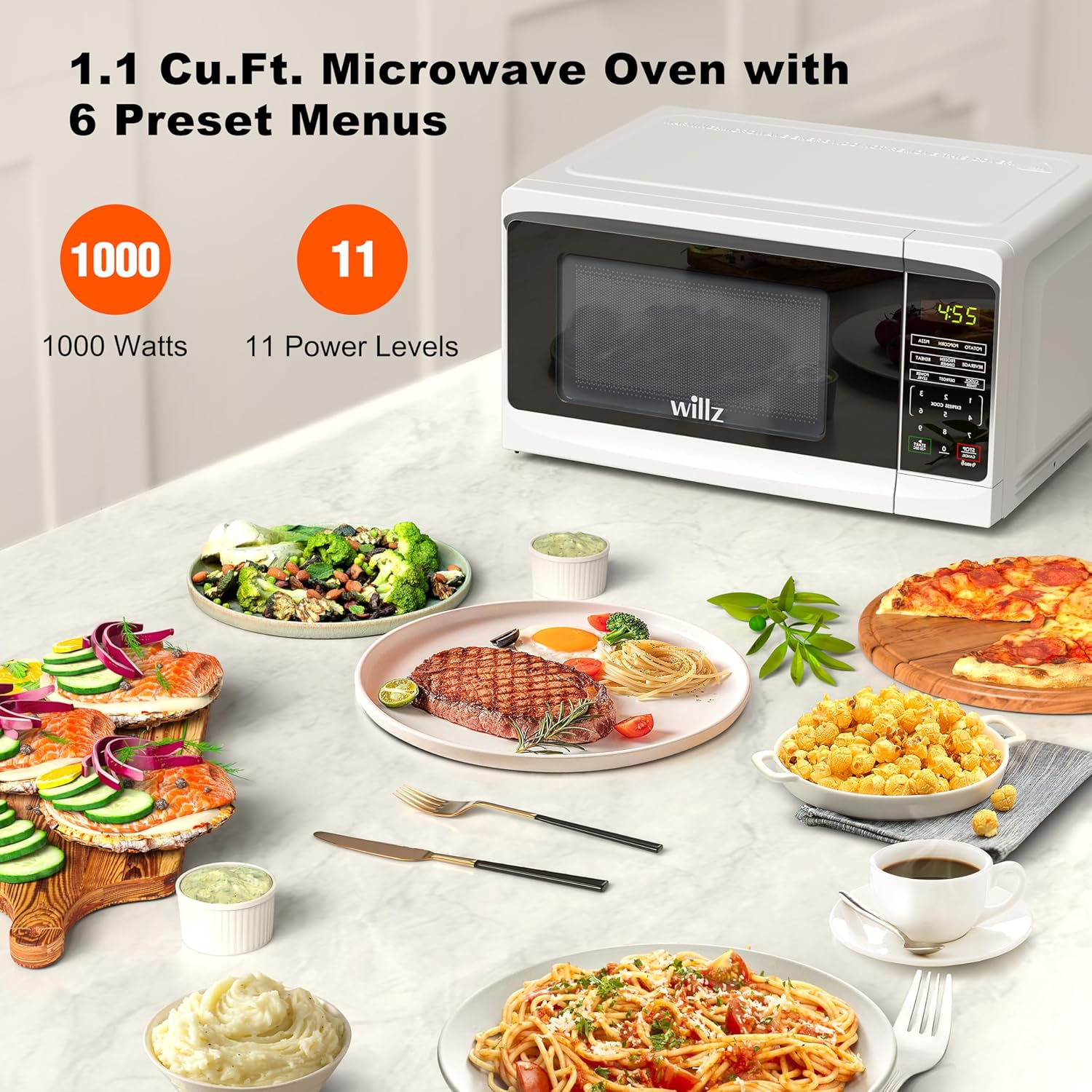 Willz microwave oven on a kitchen counter with various cooked dishes, highlighting 1000 Watts and 11 Power Levels.