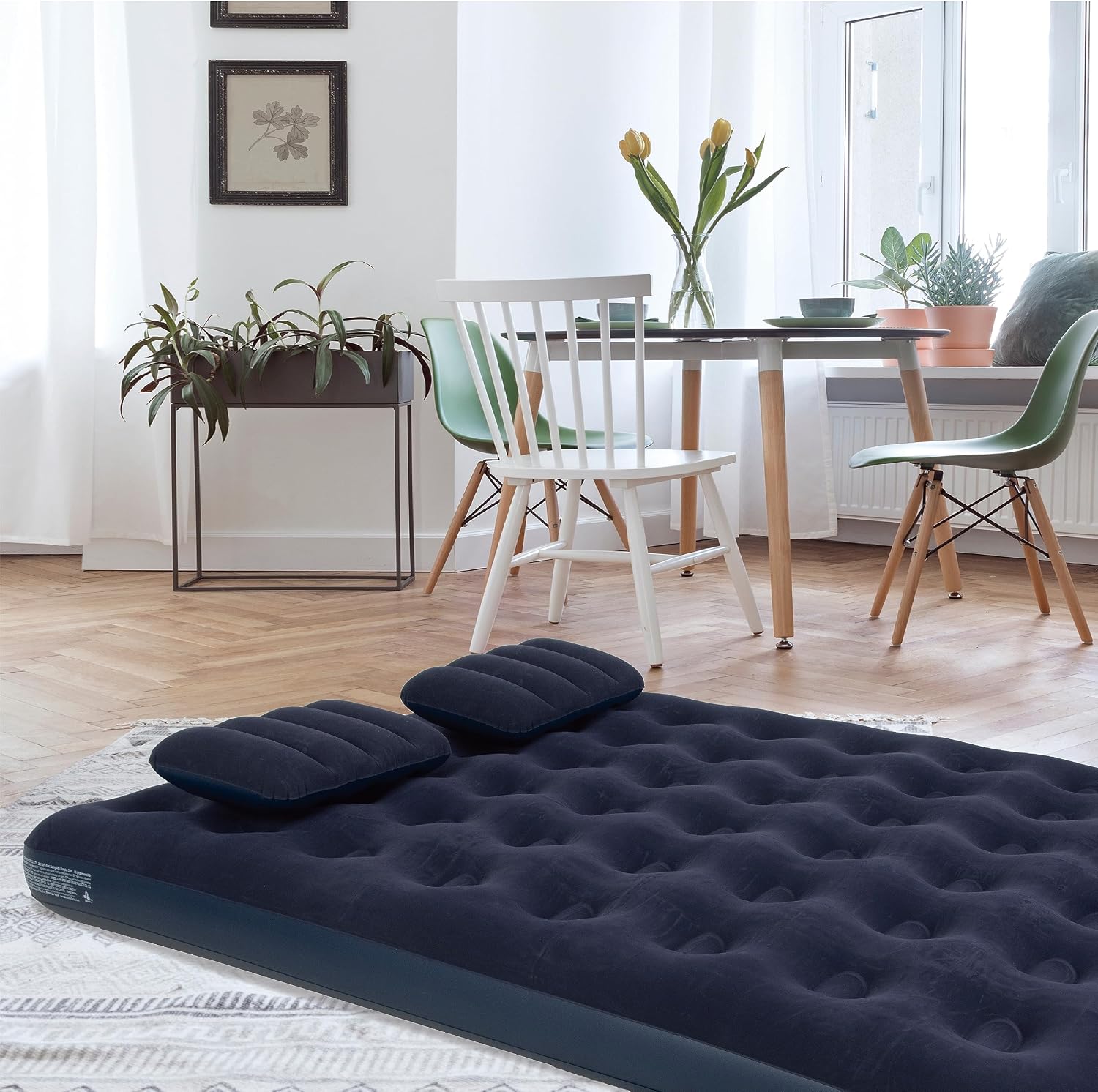 AVENLI Queen Air Mattress set up in a home living space.