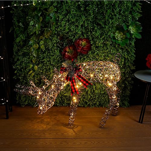 Alpine Corporation 43" Tall Rattan Grazing Reindeer with Bow and