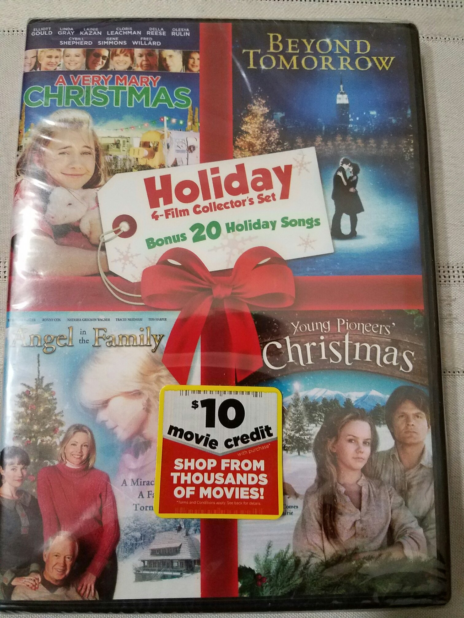 Holiday 4-Film Collection, Bonus 20 Holiday Songs, ' A Very Mary Christmas, Beyond Tomorrow, Angel In The Family, Young Pioneers' Christmas '