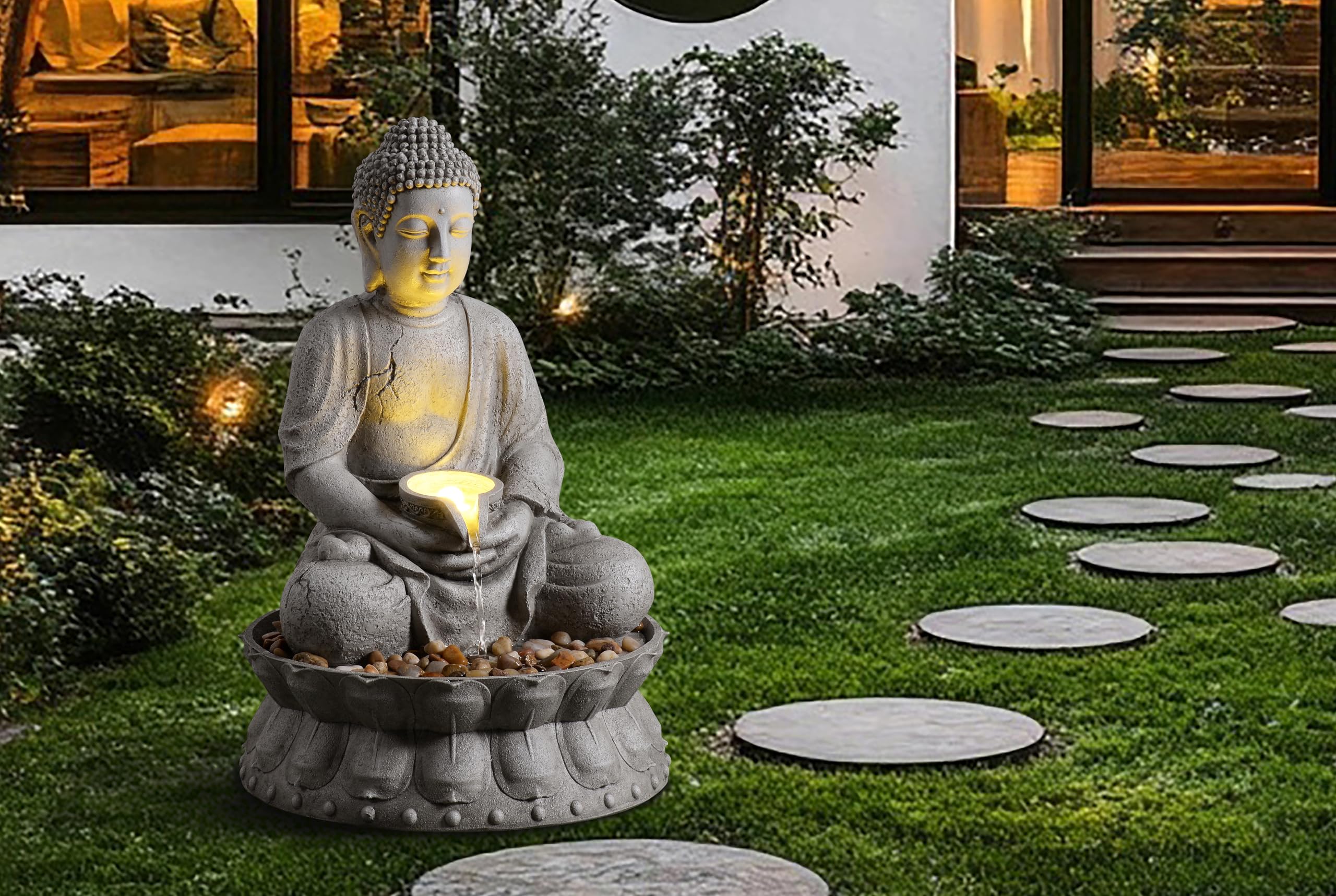 Fontaine à eau d'extérieur Bouddha méditant avec lumière LED, finition pierre grise, base lotus avec galets