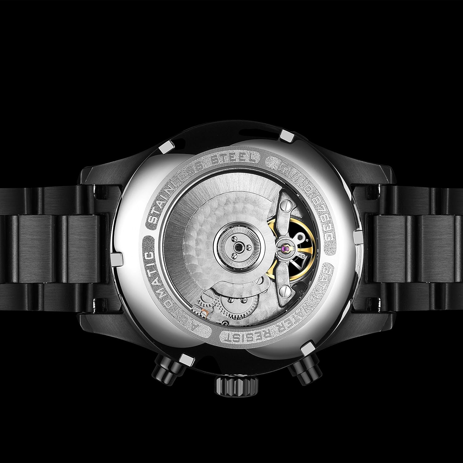 Close-up of the TEINTOP Carnival 8783G watch dial showing the time, day, and date subdials, and the exposed balance wheel.