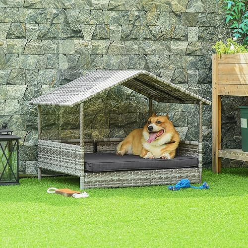 Miniatura 2 de PawHut Casa de mimbre para perros al aire libre con toldo, cama de ratán para perros con cojín resistente al agua, cama elevada para mascotas para