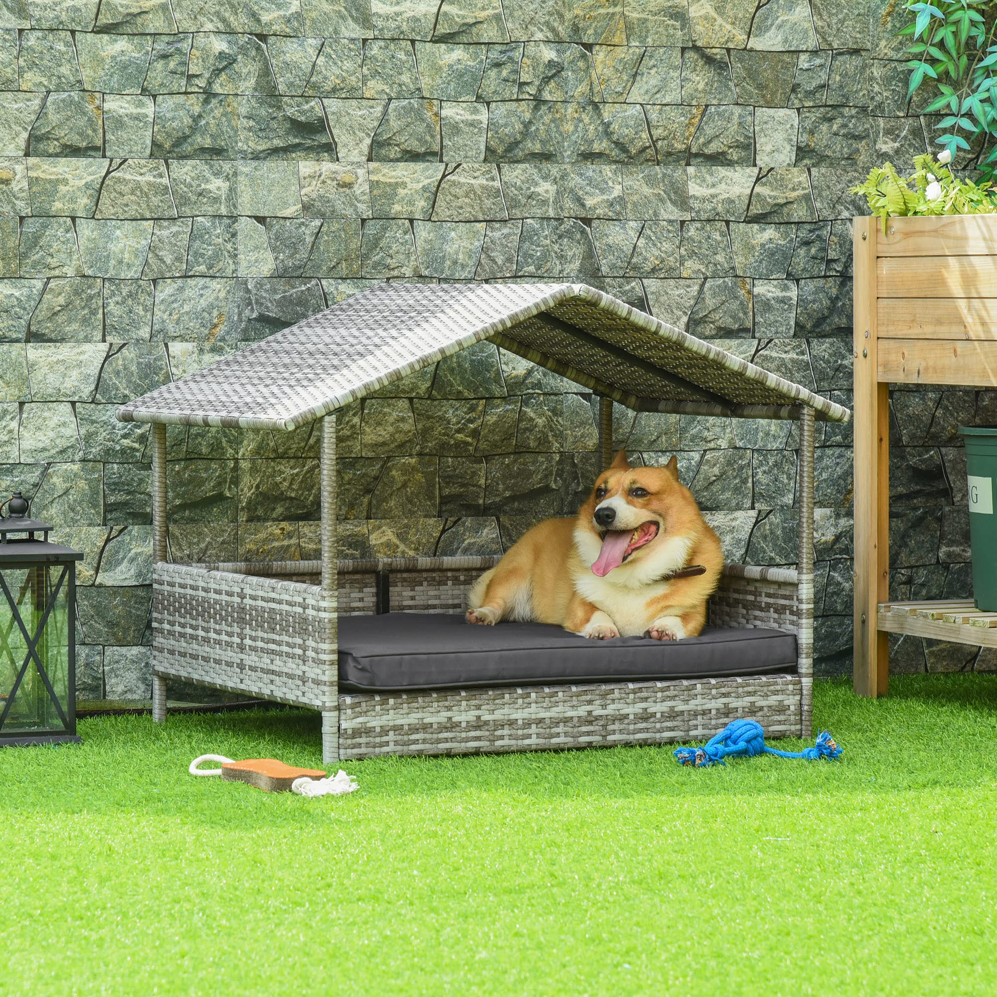 Casa para Perros PawHut de ratán con cojín, Cama para Perros en Forma de casa, caseta para Perros de Exterior, Estructura de Acero, plástico, Gris, 69 x 98 x 70 cm