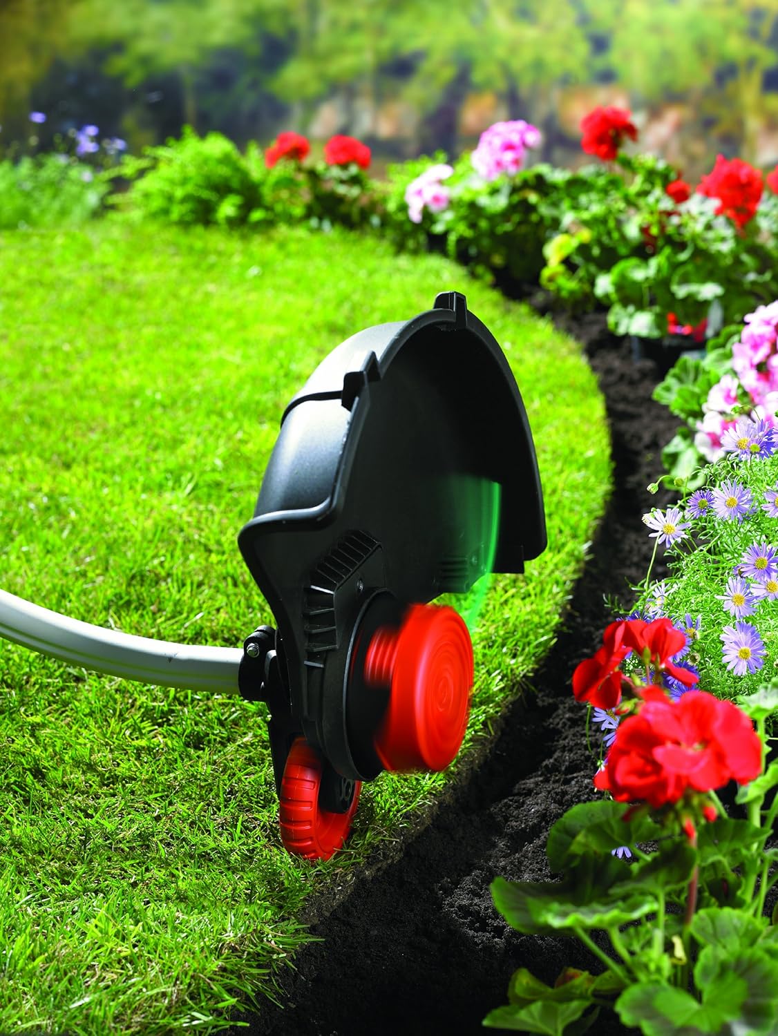 Close-up of the automatic line feed mechanism on the trimmer head