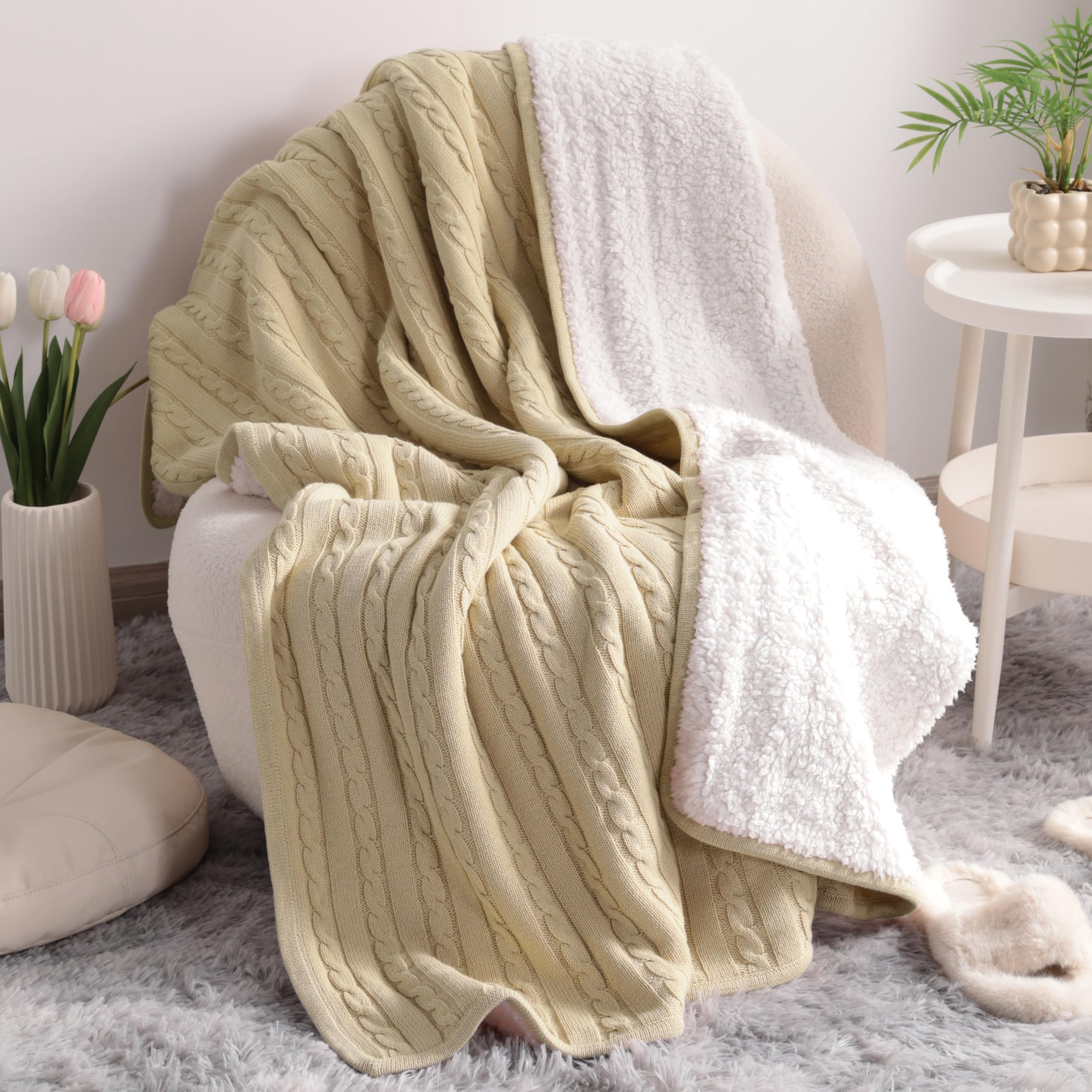 Couverture tricot torsadé Sherpa kaki idéale pour vos soirées cocooning