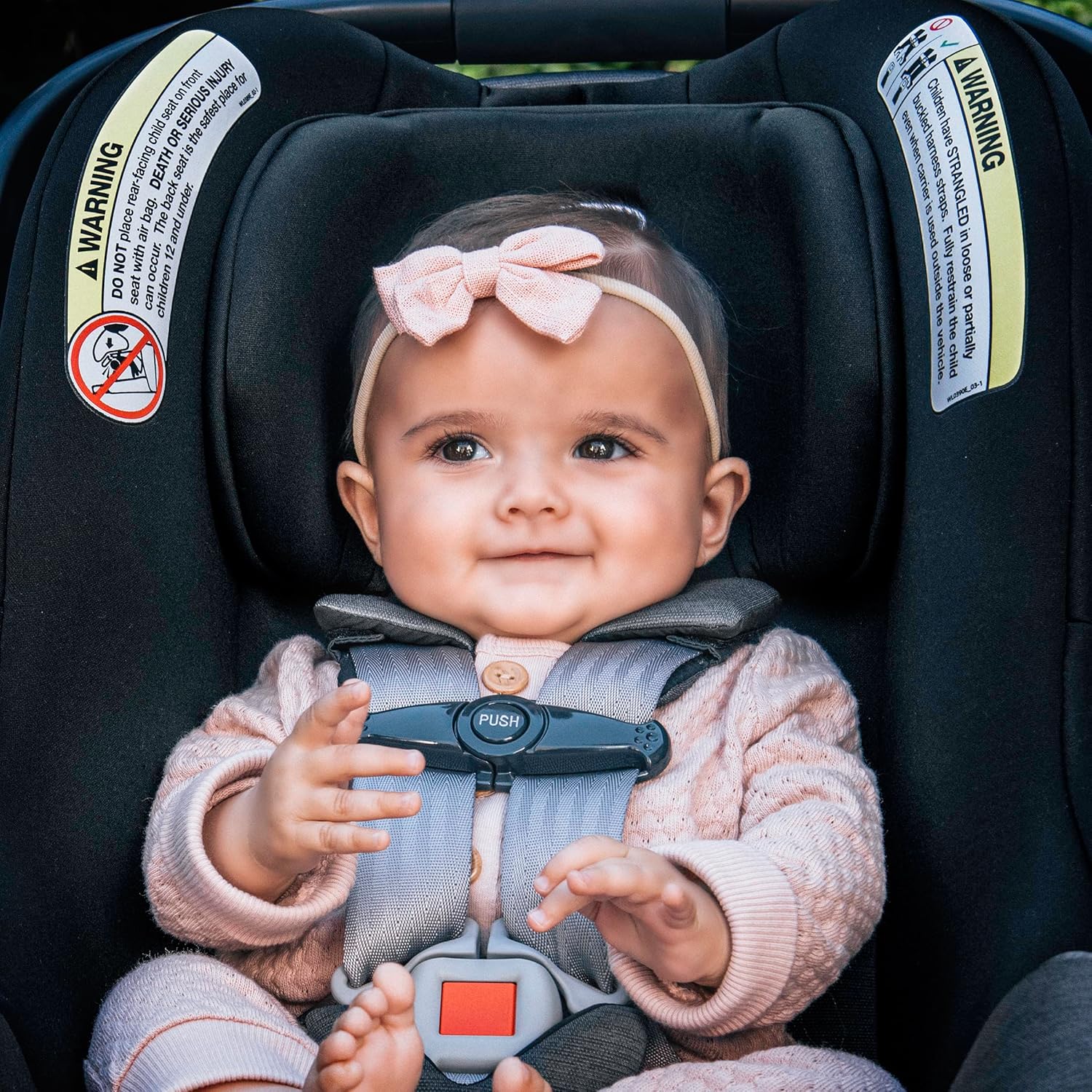 Infant secured in Chicco KeyFit Max ClearTex Car Seat