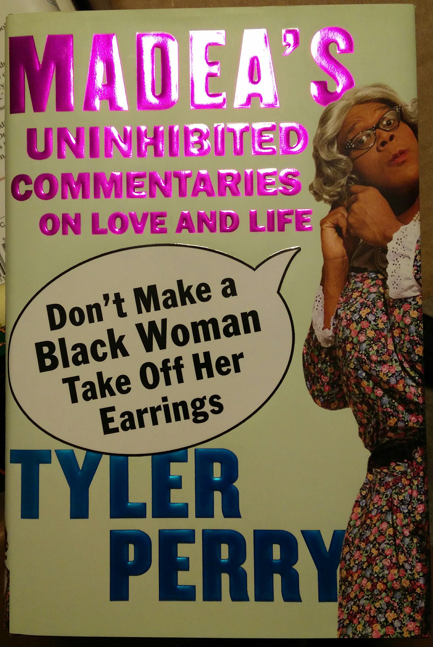 Cover of Don't Make a Black Woman Take Off Her Earrings: Madea's Uninhibited Commentaries on Love and Life