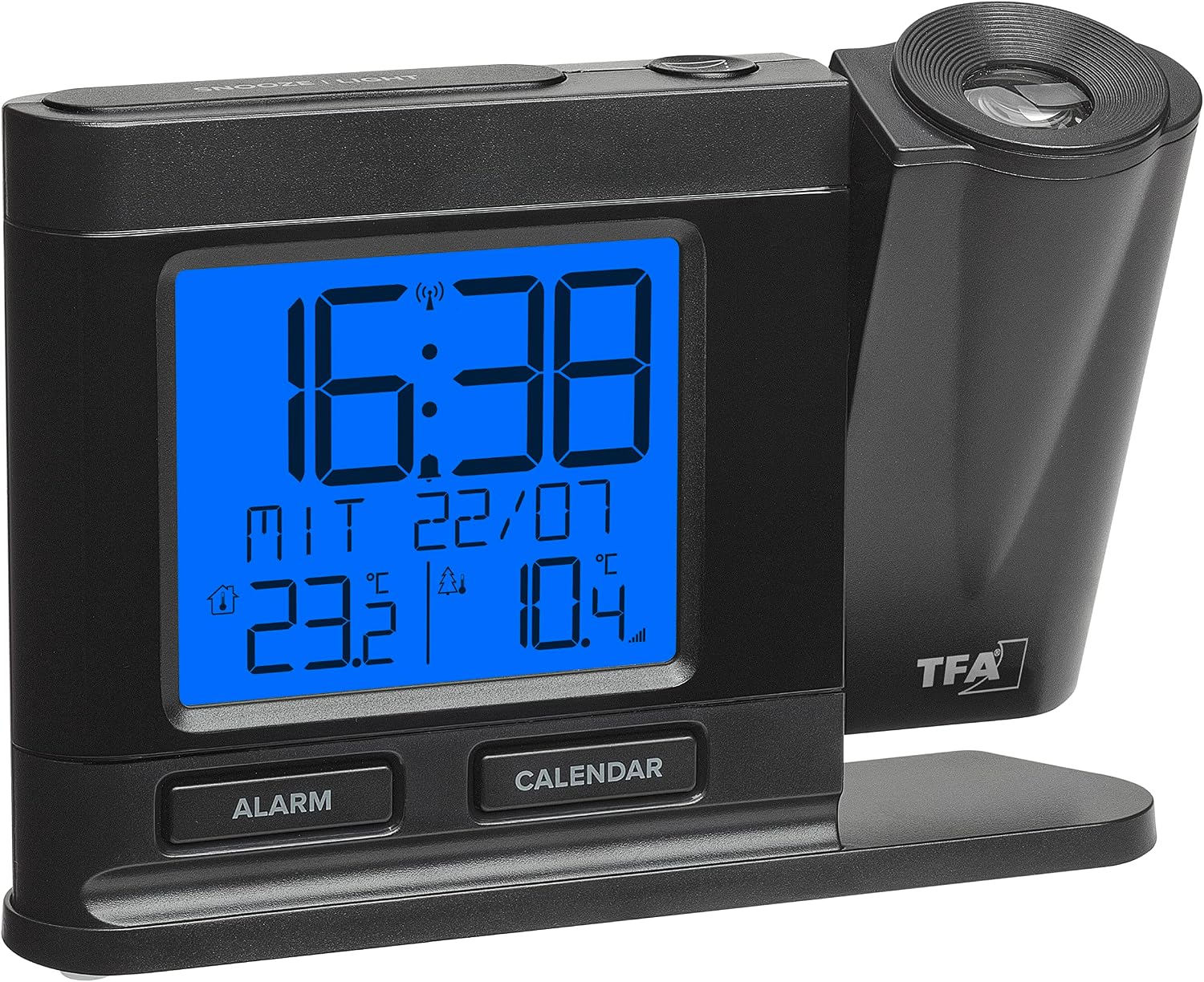 Front view of the TFA Dostmann 60.5018.01 alarm clock with a bright blue backlight, showing time, date, and temperatures.