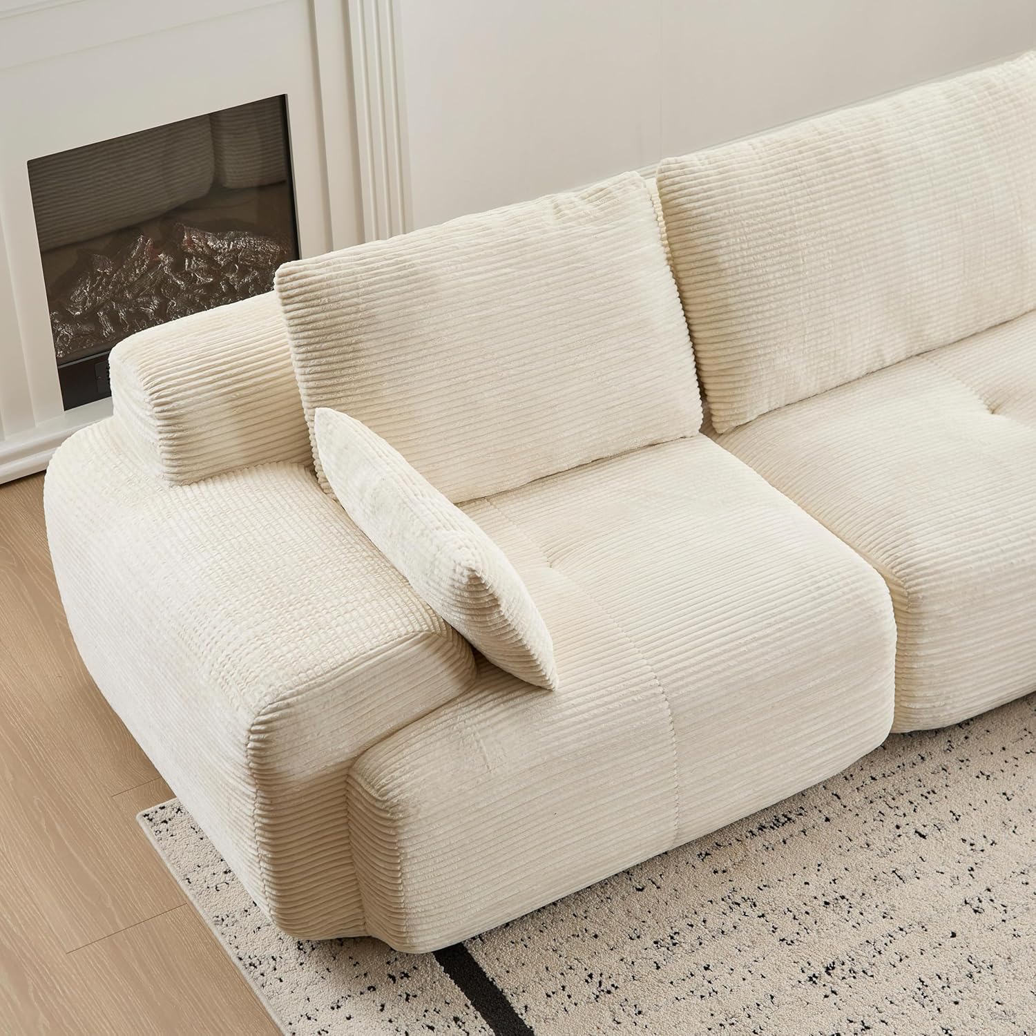 Close-up of the OUEEEDD Modular Sectional Sofa's corduroy fabric and cushions