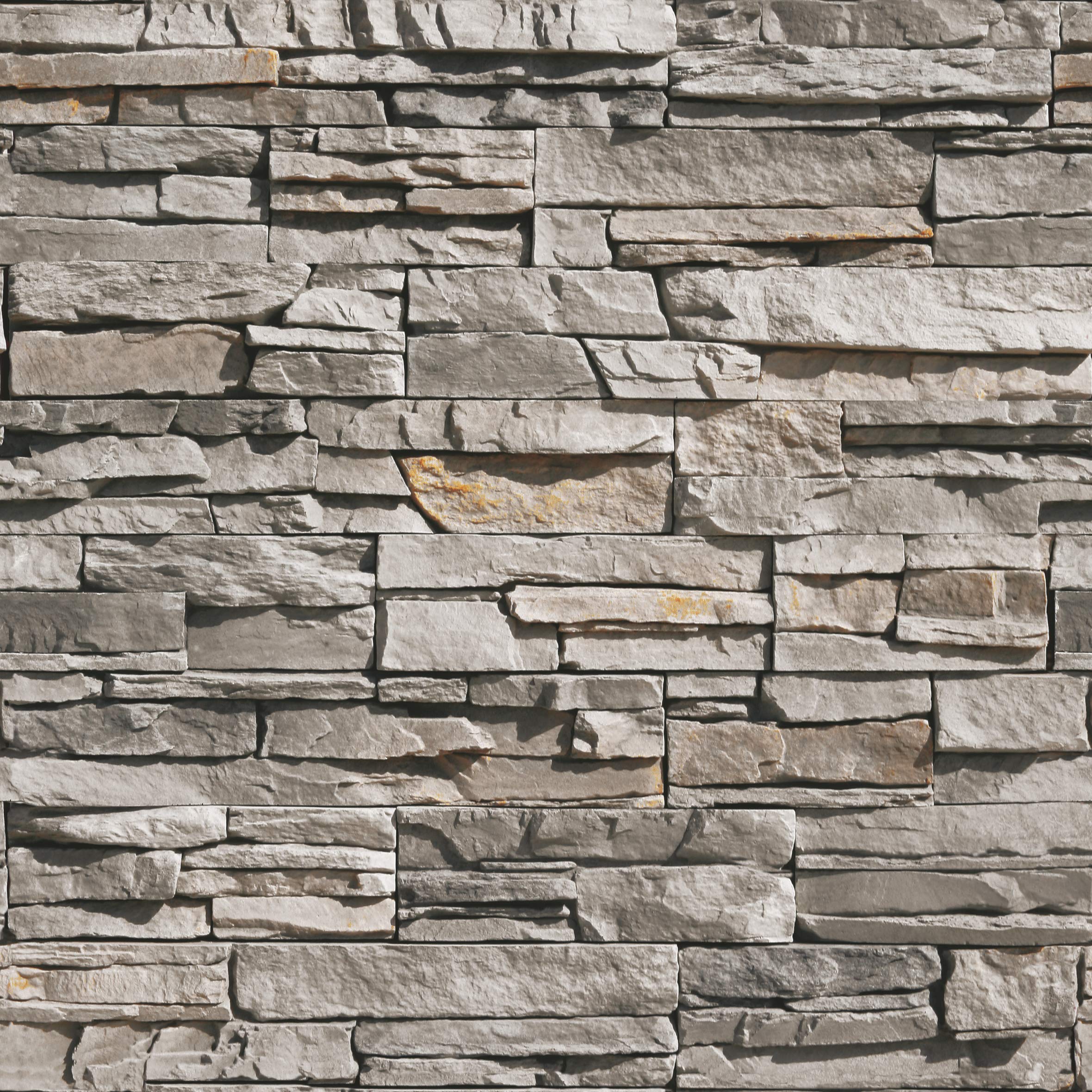 Rivestimento Pietre D'Arredo realizzato con elementi di finitura in vera pietra ricostruita. Sakar Grigio Chiaro. Dimensione cm. 20/30/50x10 H. Unità di vendita scatola da 0,50 metri quadrati.