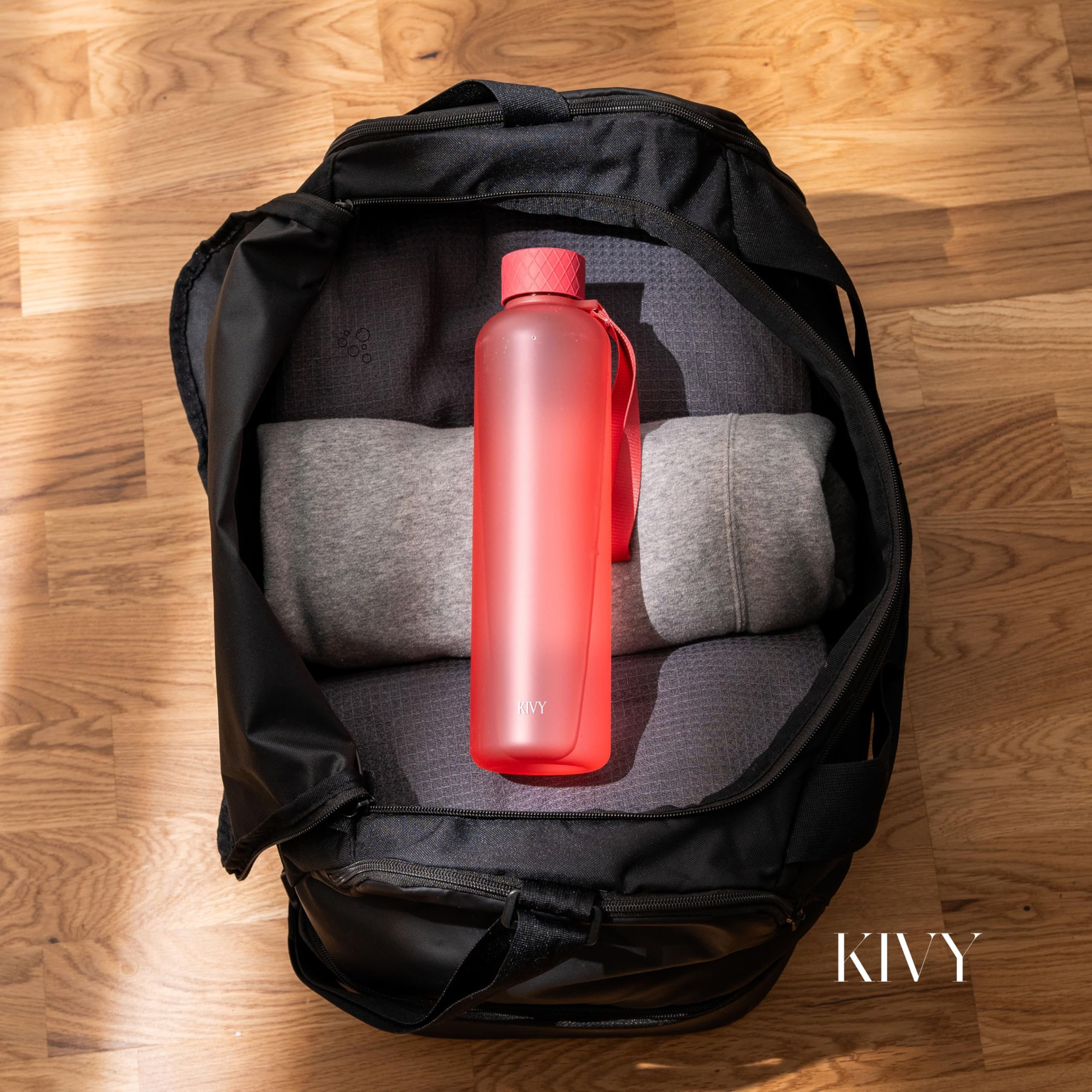 KIVY Borraccia 1 litro - Antigoccia e Antiurto – Perfetta per Sport, Scuola e Ufficio - Borraccia Palestra - Bottiglia 1 Litro - Bottiglia Acqua - Plastica Borracce Sportiva 1l - Senza BPA - Corallo
