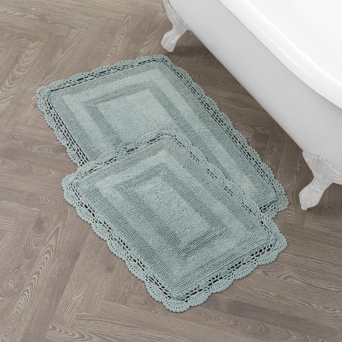 Laura Ashley Alfombra de baño absorbente reversible de ganchillo, suave y afelpada, 100% algodón, juego de alfombras de baño de 2 piezas, color azul aguamarina
