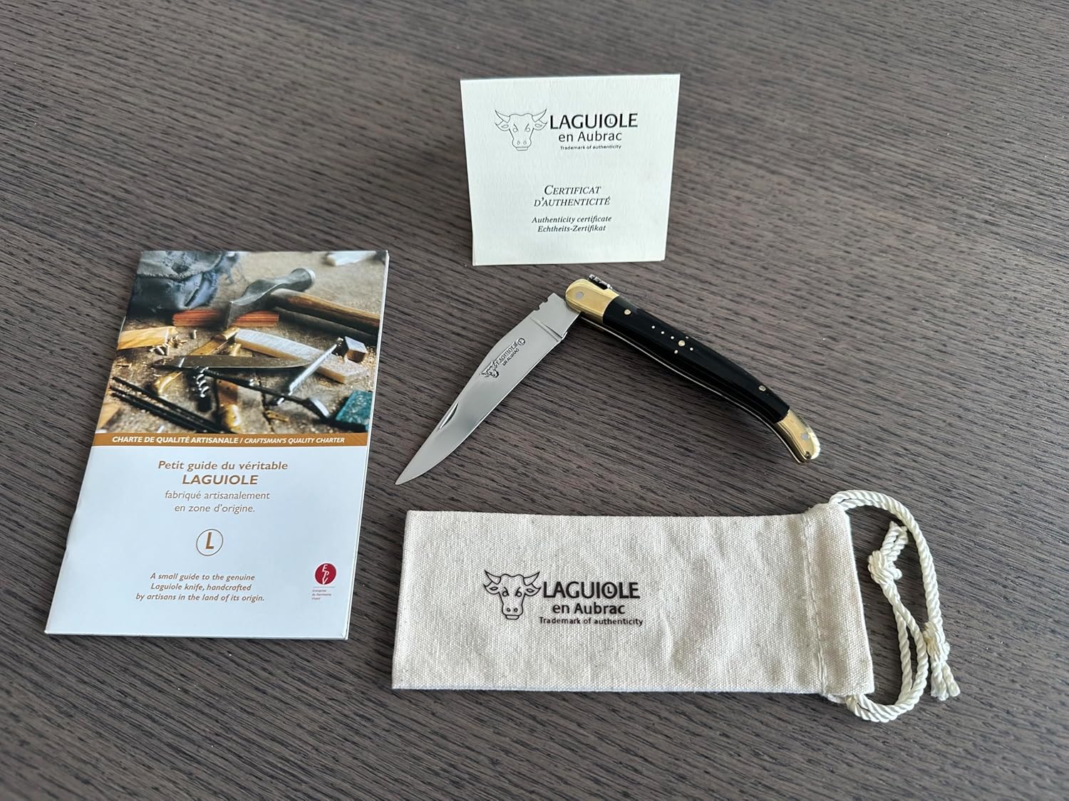 Laguiole en Aubrac Handcarved Luxury Folding Pocket Knife With Buffalo Horn Handle, 4.3-Inches (11 cm), Brass Bolster