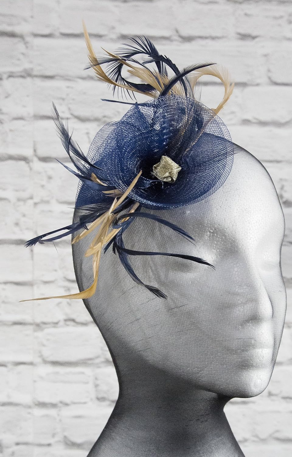 Navy blue fascinator with Gold on a 