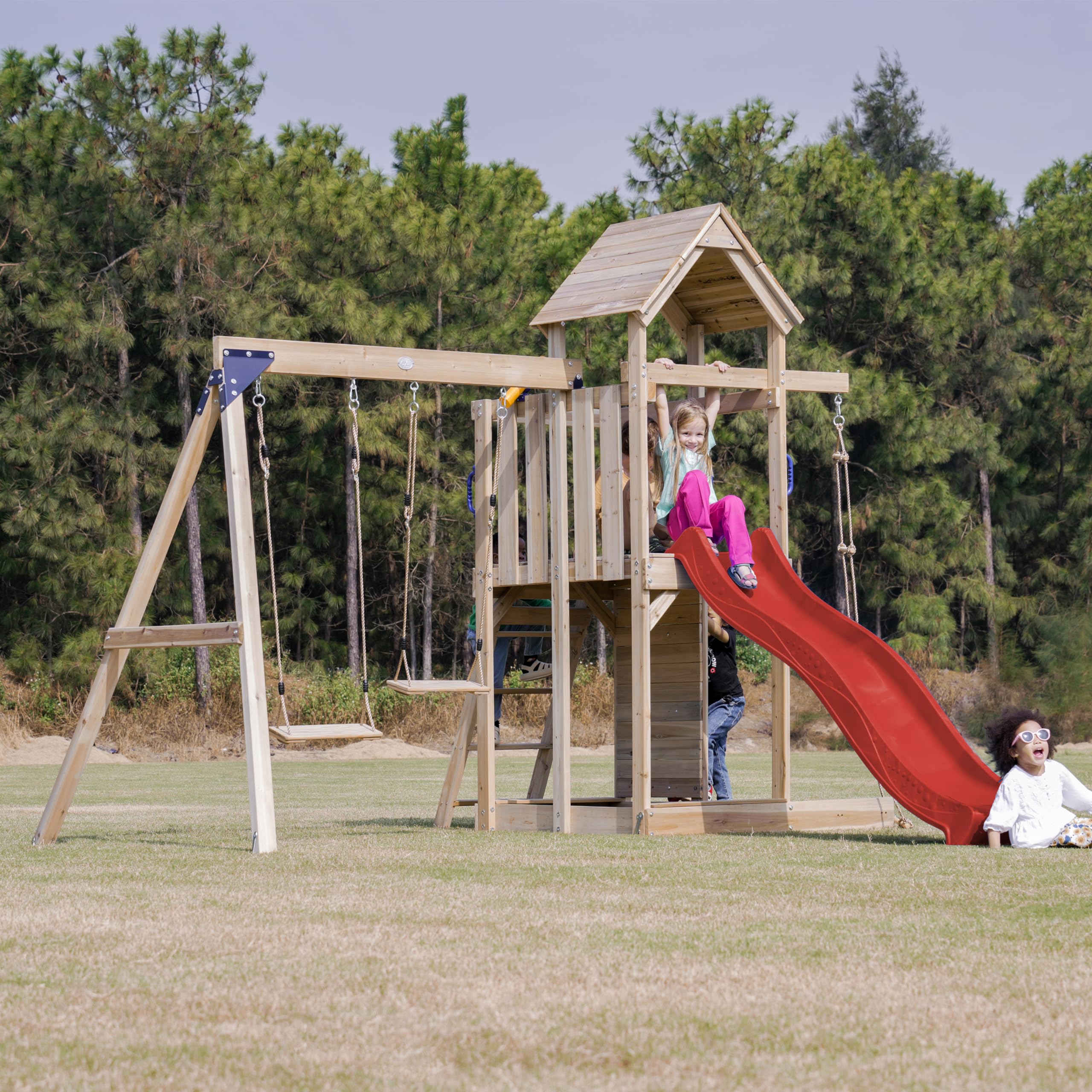 AXI Moos Spielturm aus Holz mit 2 Schaukeln & Strickleiter | XXL Spielhaus/Spielplatz für Kinder mit Kletterwand, Sandkasten & Rutsche in Rot | Schaukelgerüst für den Garten