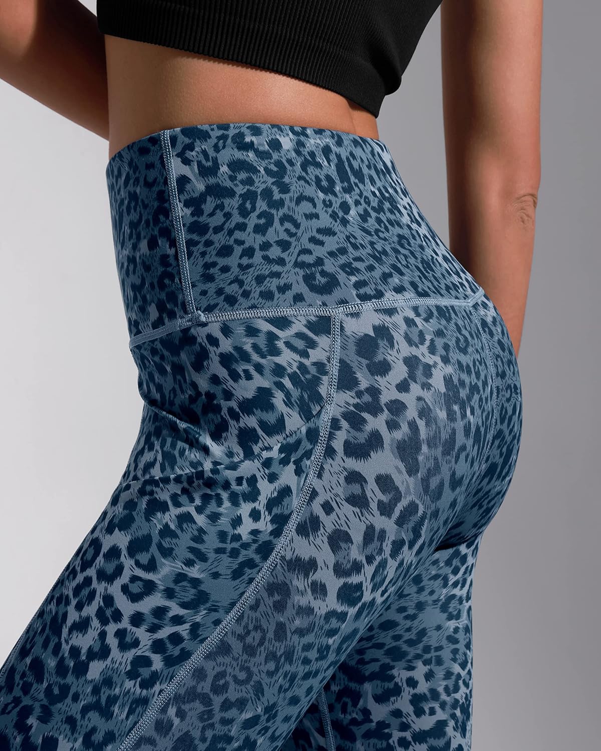 ODODOS Women's High Waisted Yoga Capris with Pockets, Tummy Control Non See Through Workout Athletic Running Capri Leggings - Image 2