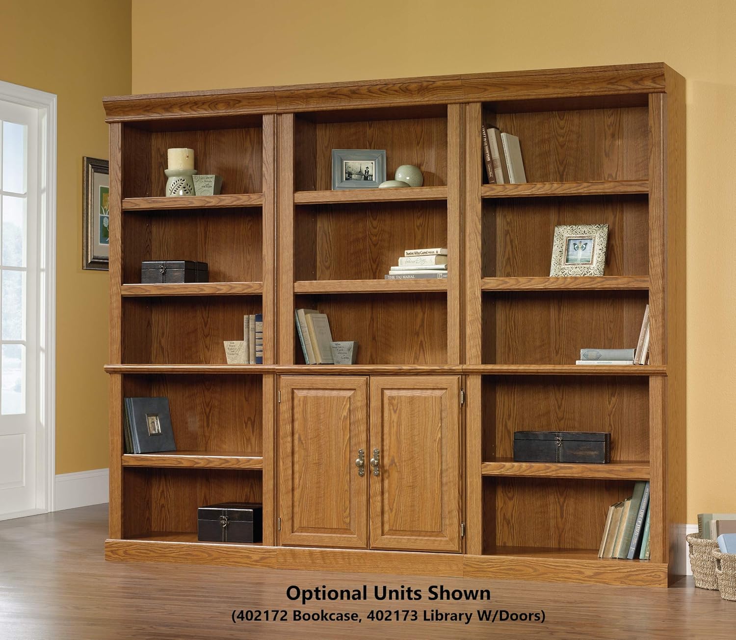 Sauder Orchard Hills Library with Doors filled with books and decor