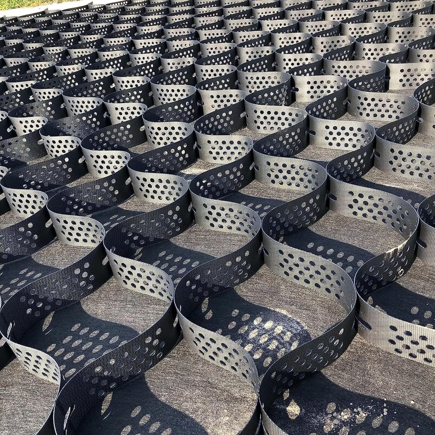 Géogrille de gravier pour aménagement de jardin et création de trottoirs propres